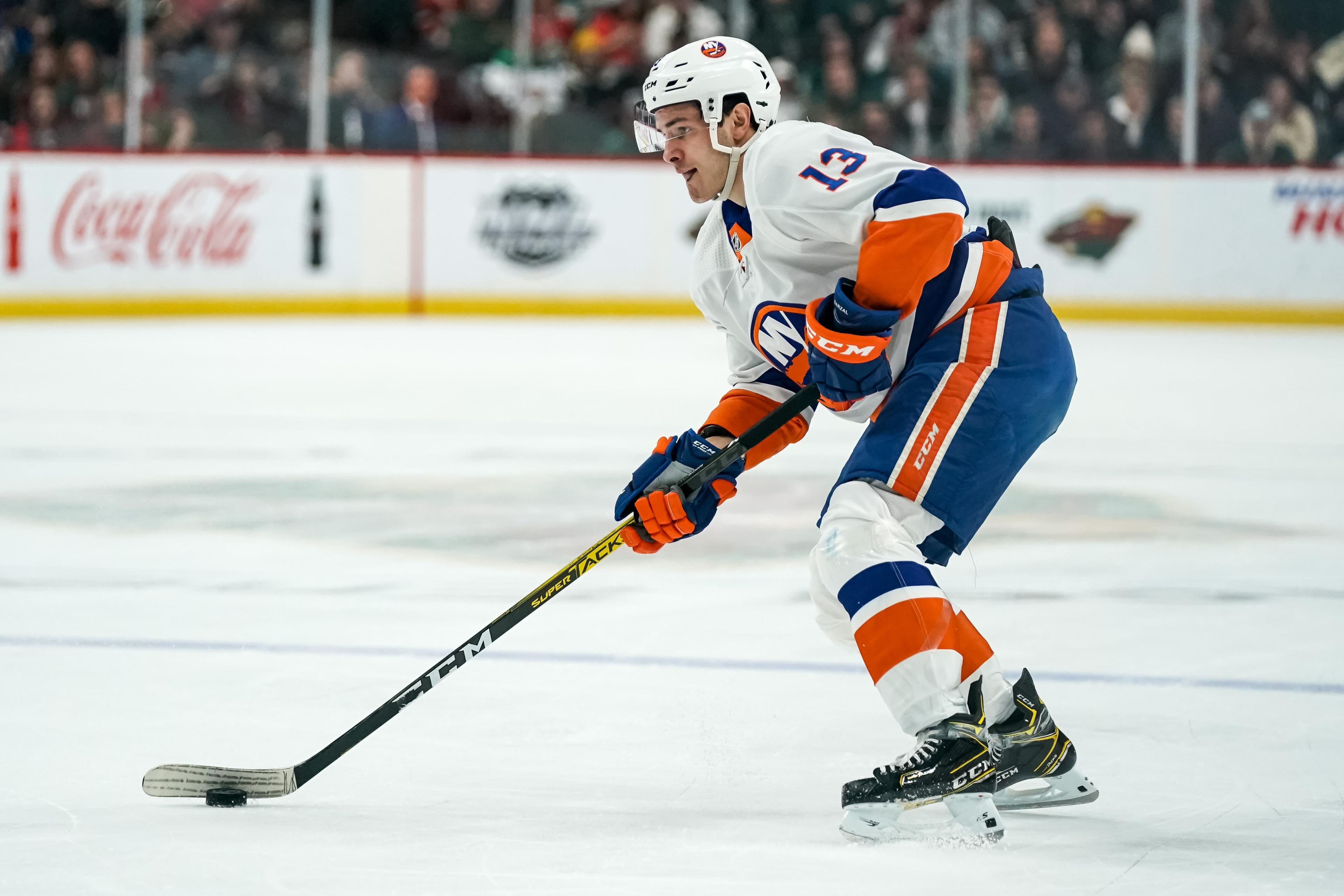 Dec 29, 2019; Saint Paul, Minnesota, USA; New York Islanders forward Mathew Barzal (13) looks to pass during the first period against the Minnesota Wild at Xcel Energy Center. Mandatory Credit: Brace Hemmelgarn-USA TODAY Sports / Brace Hemmelgarn