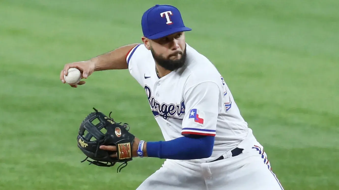 Texas Rangers shortstop Isiah Kiner-Falefa (9) attempts to turn a double play in the first inning against the Chicago White Sox at Globe Life Field. / Tim Heitman-USA TODAY Sports