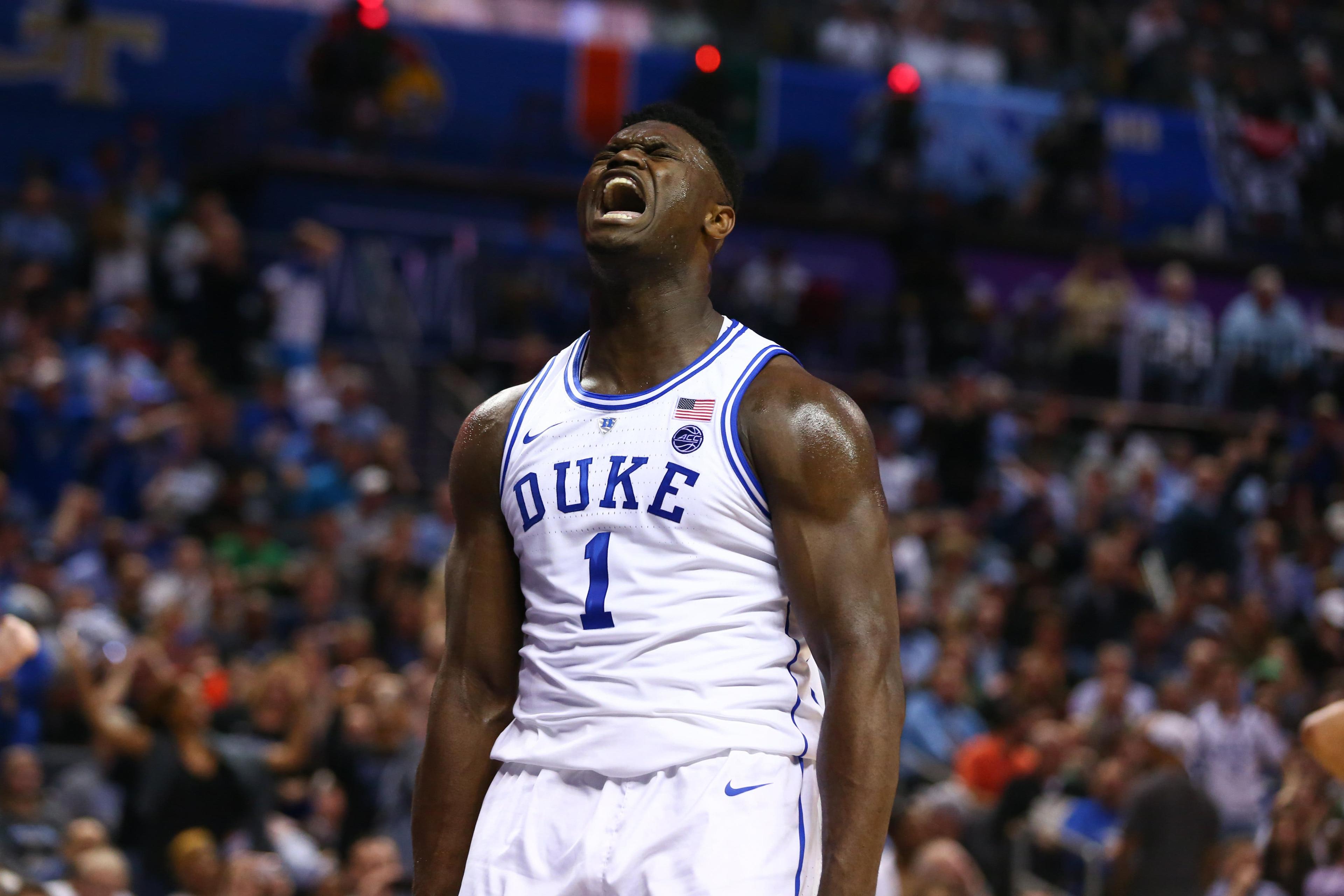 Mar 14, 2019; Charlotte, NC, USA; Duke Blue Devils forward Zion Williamson (1) reacts after a dunk in the first half against the Syracuse Orange in the ACC conference tournament at Spectrum Center. Mandatory Credit: Jeremy Brevard-USA TODAY Sports / Jeremy Brevard