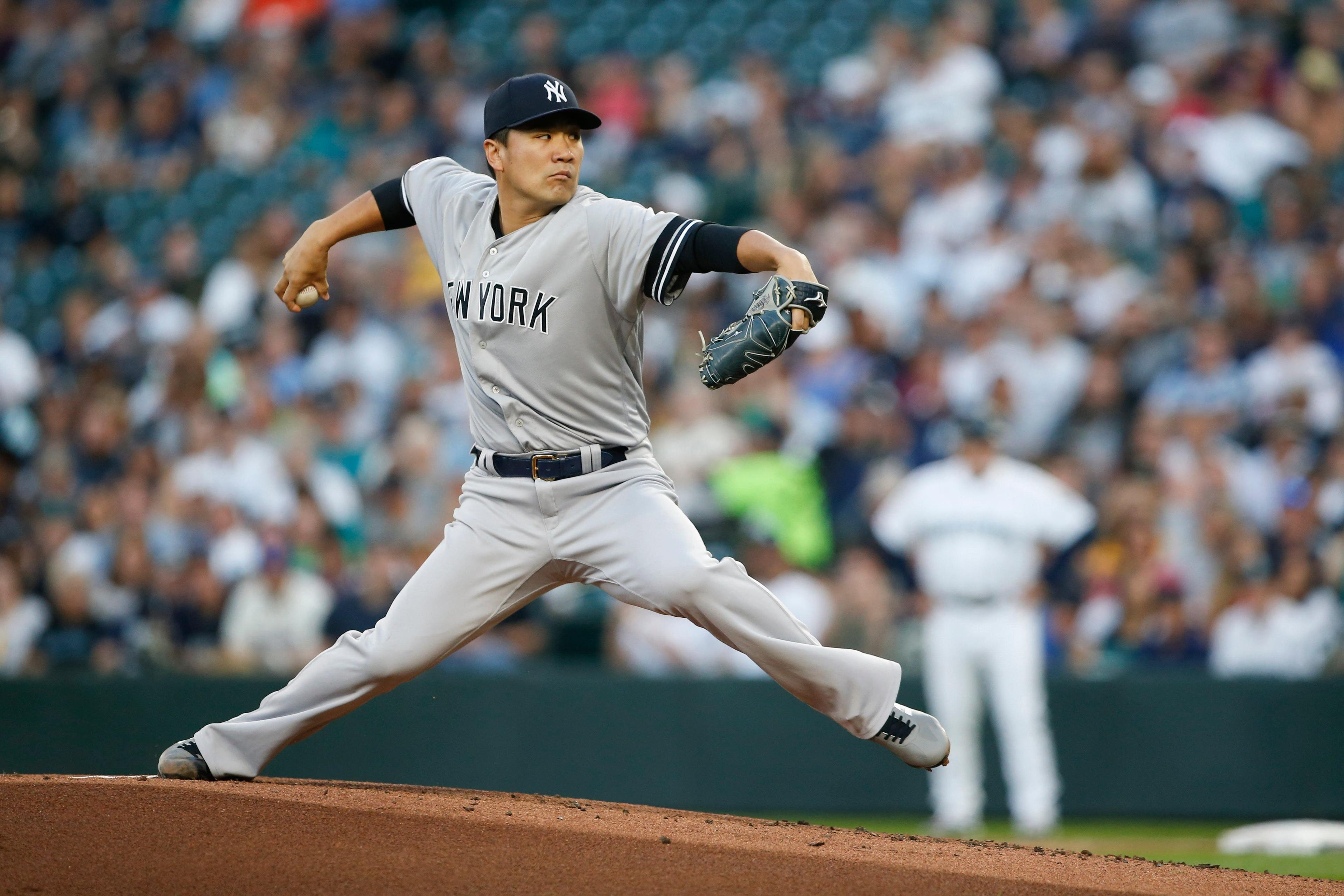 Aug 27, 2019; Seattle, WA, USA; New York Yankees starting pitcher Masahiro Tanaka (19) throws against the Seattle Mariners during the first inning at T-Mobile Park. Mandatory Credit: Joe Nicholson-USA TODAY Sports / Joe Nicholson