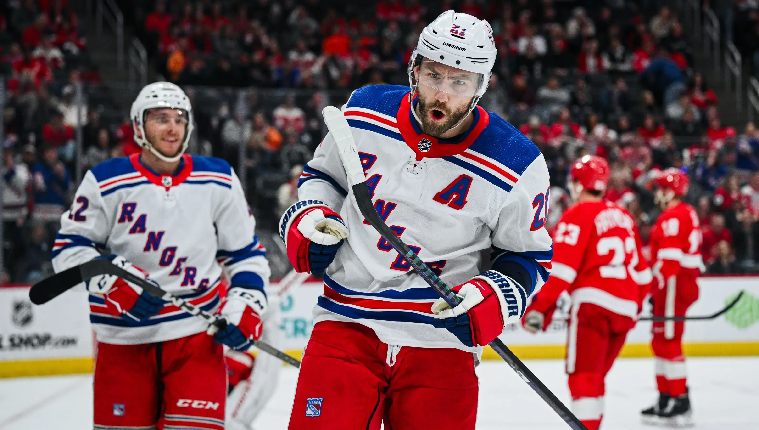 New York Rangers center Barclay Goodrow (21) celebrates his goal with center Jonny Brodzinski (22) during the first period against the Detroit Red Wings at Little Caesars Arena. / Tim Fuller-USA TODAY Sports