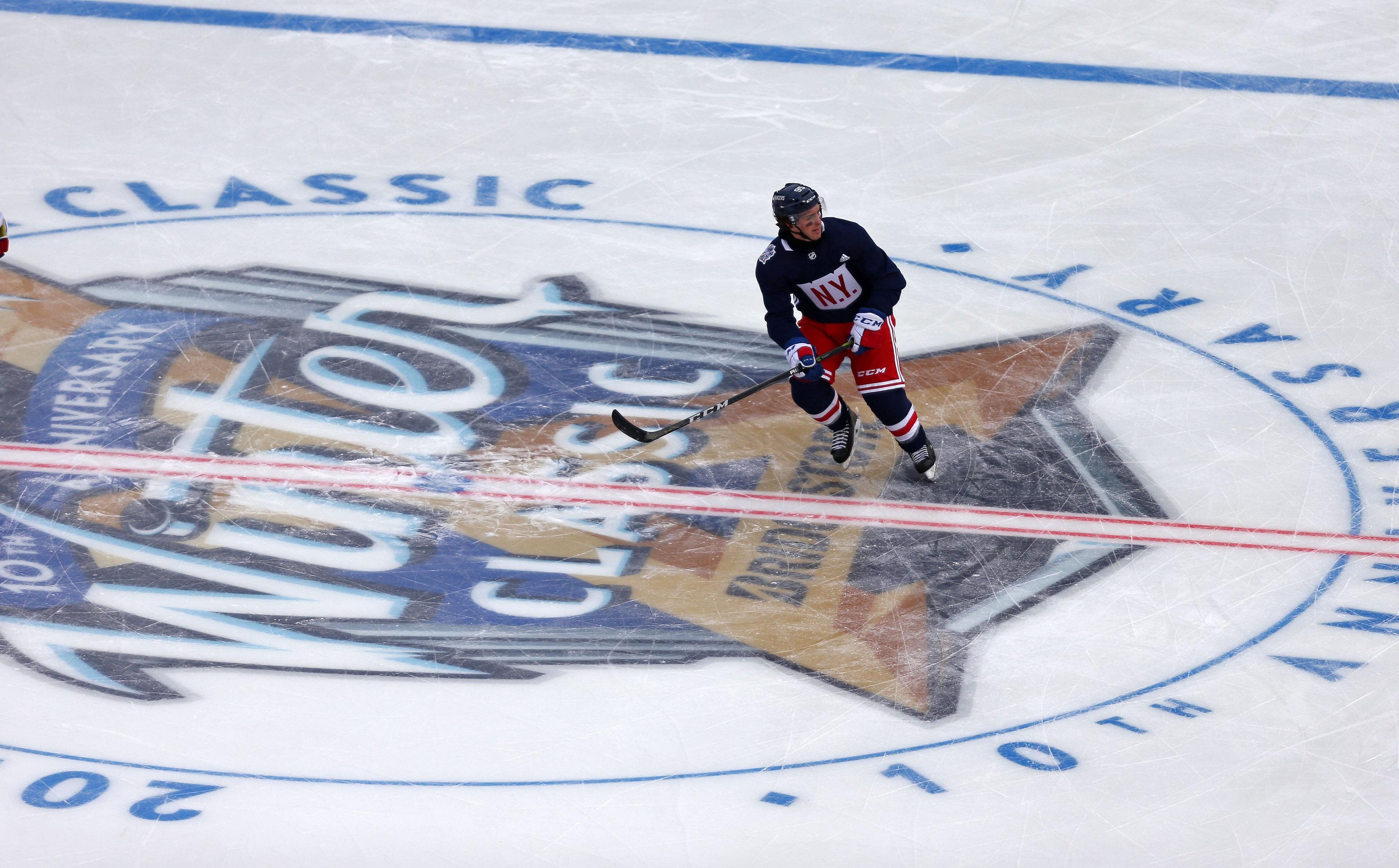 Dec 31, 2017; New York, NY, USA; New York Rangers center Vinni Lettieri (95) skates over the Winter Classic logo during practice for the Winter Classic hockey game at Citi Field. Mandatory Credit: Danny Wild-USA TODAY Sports / Danny Wild