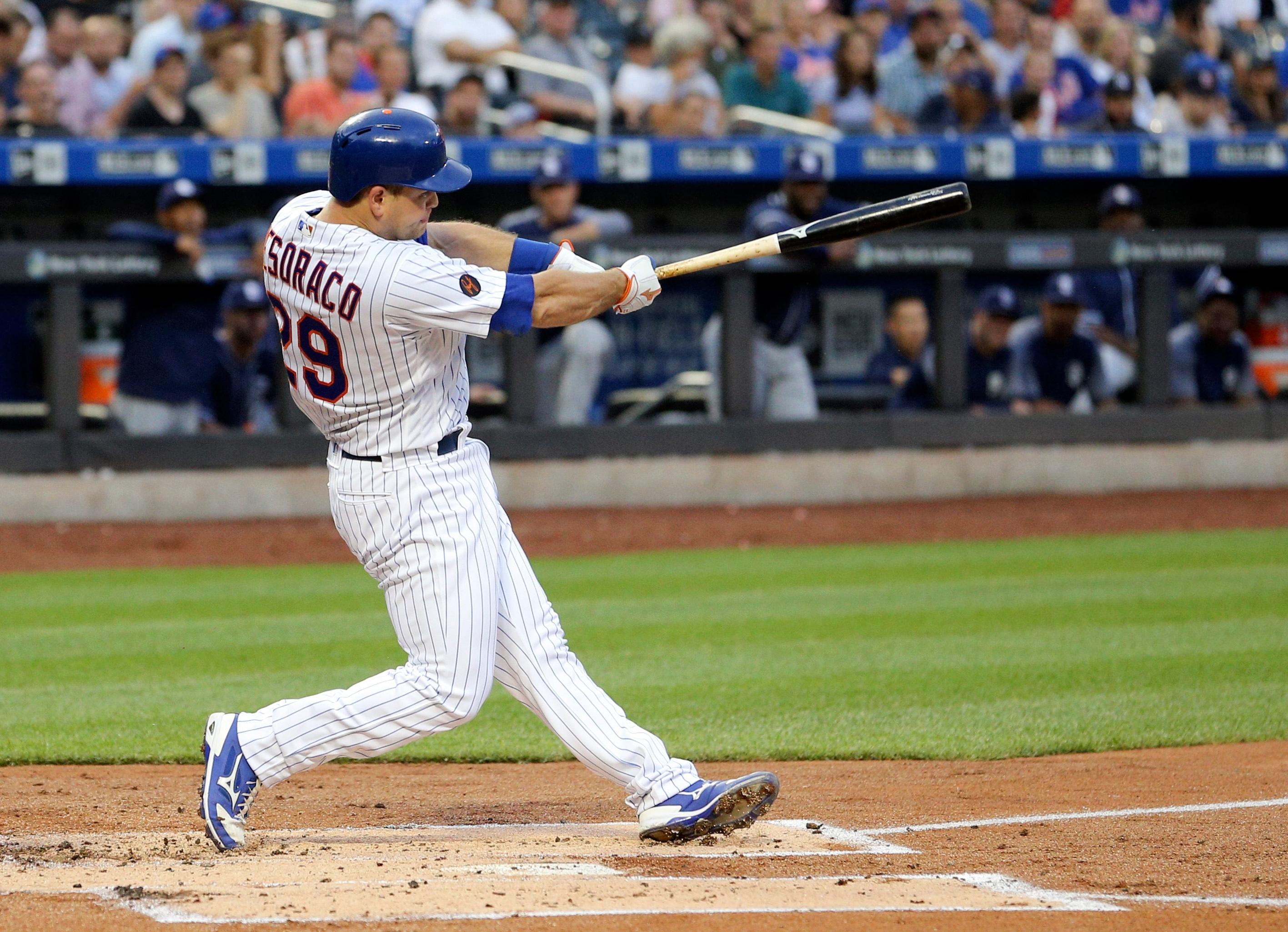 Jul 24, 2018; New York City, NY, USA; New York Mets catcher Devin Mesoraco (29) hits a three-run double against the San Diego Padres during the first inning at Citi Field. Mandatory Credit: Brad Penner-USA TODAY Sports