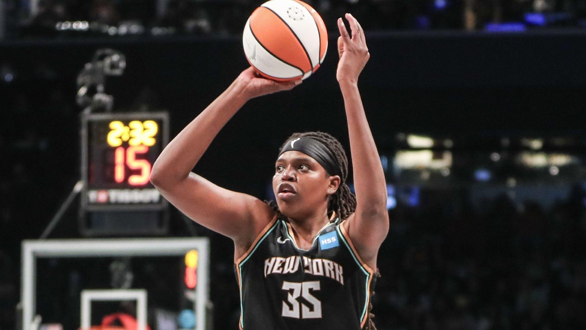 Oct 15, 2023; Brooklyn, New York, USA; New York Liberty forward Jonquel Jones (35) takes a three point shot against the Las Vegas Aces in the third quarter during game three of the 2023 WNBA Finals at Barclays Center. 