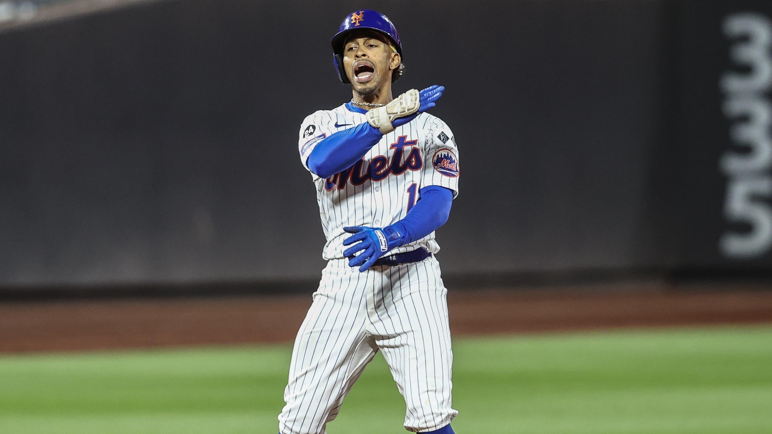 New York Mets shortstop Francisco Lindor (12) celebrates after hitting an RBI double in the eighth inning against the Boston Red Sox at Citi Field / Wendell Cruz - Imagn Images