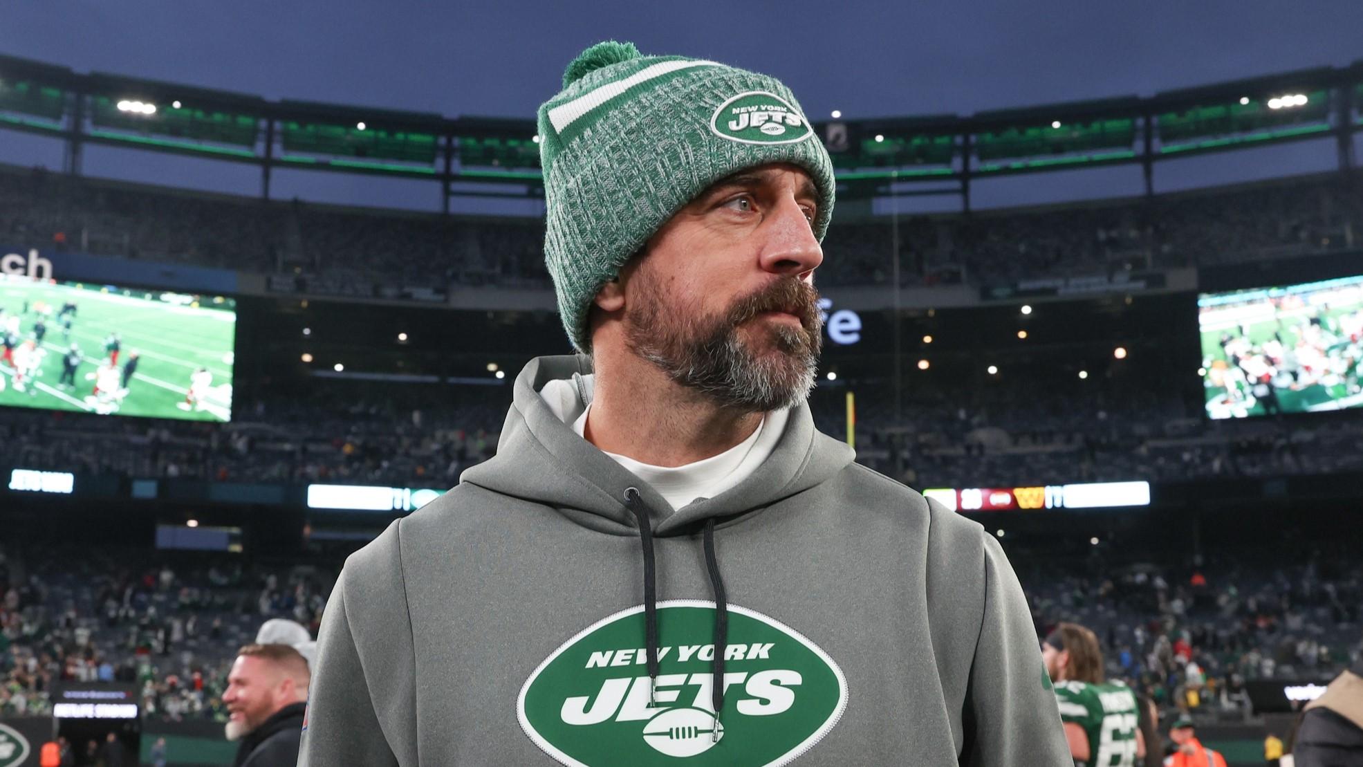 Caption: Dec 24, 2023; East Rutherford, New Jersey, USA; New York Jets quarterback Aaron Rodgers (8) on the field after the game against the Washington Commanders at MetLife Stadium.