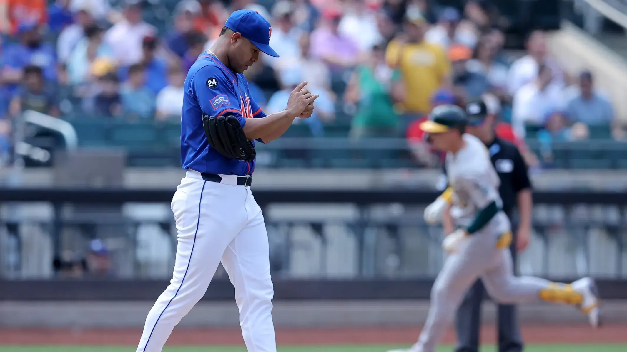 Aug 15, 2024; New York City, New York, USA; New York Mets starting pitcher Jose Quintana (62) reacts as Oakland Athletics center fielder JJ Bleday (33) rounds the bases after hitting a grand slam home run during the fourth inning at Citi Field. / Brad Penner-USA TODAY Sports