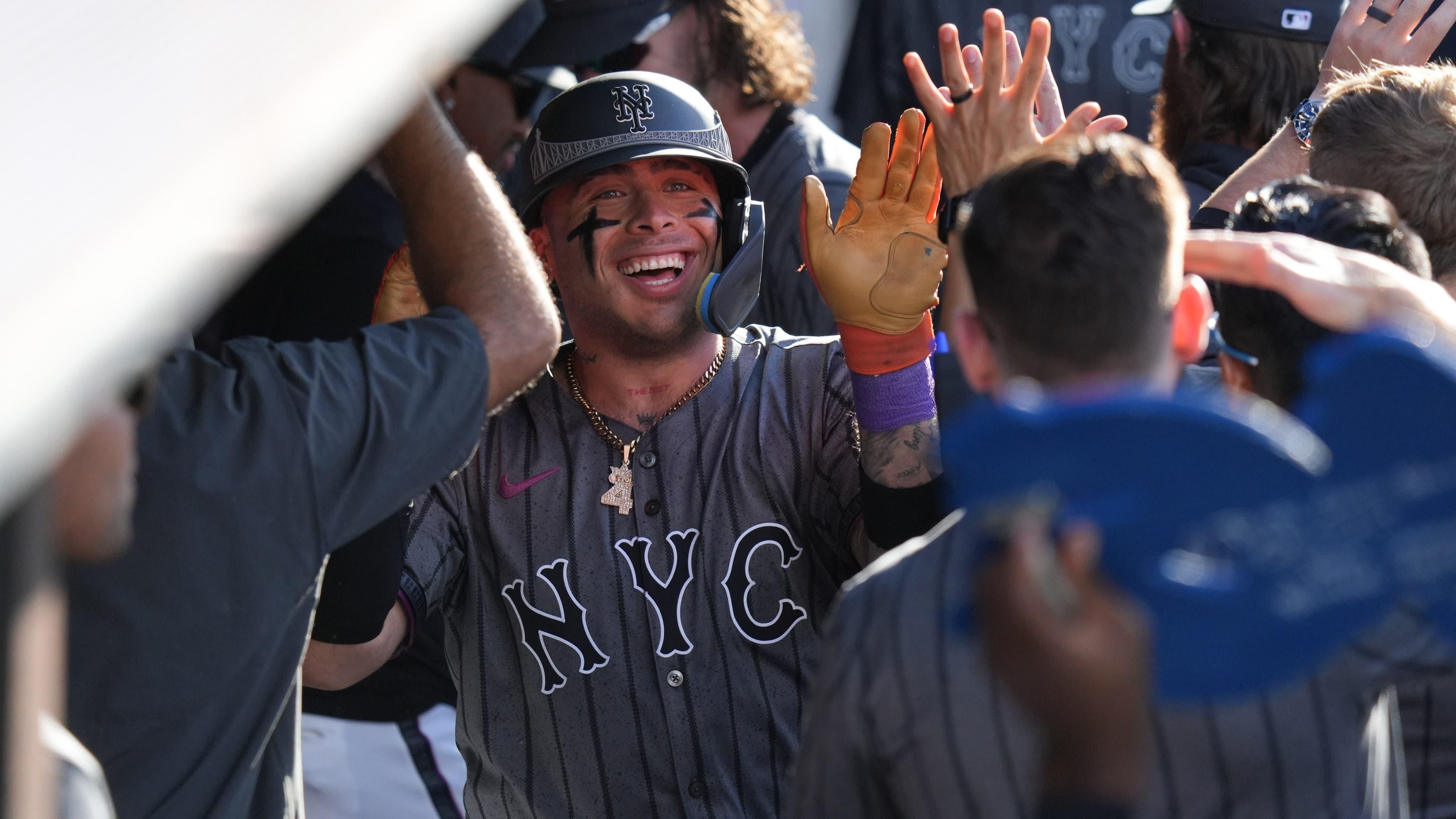 Sep 21, 2024; New York City, New York, USA; New York Mets catcher Francisco Alvarez (4) celebrates in the dugout after hitting a home run during the second inning against the Philadelphia Phillies at Citi Field. / Lucas Boland-Imagn Images