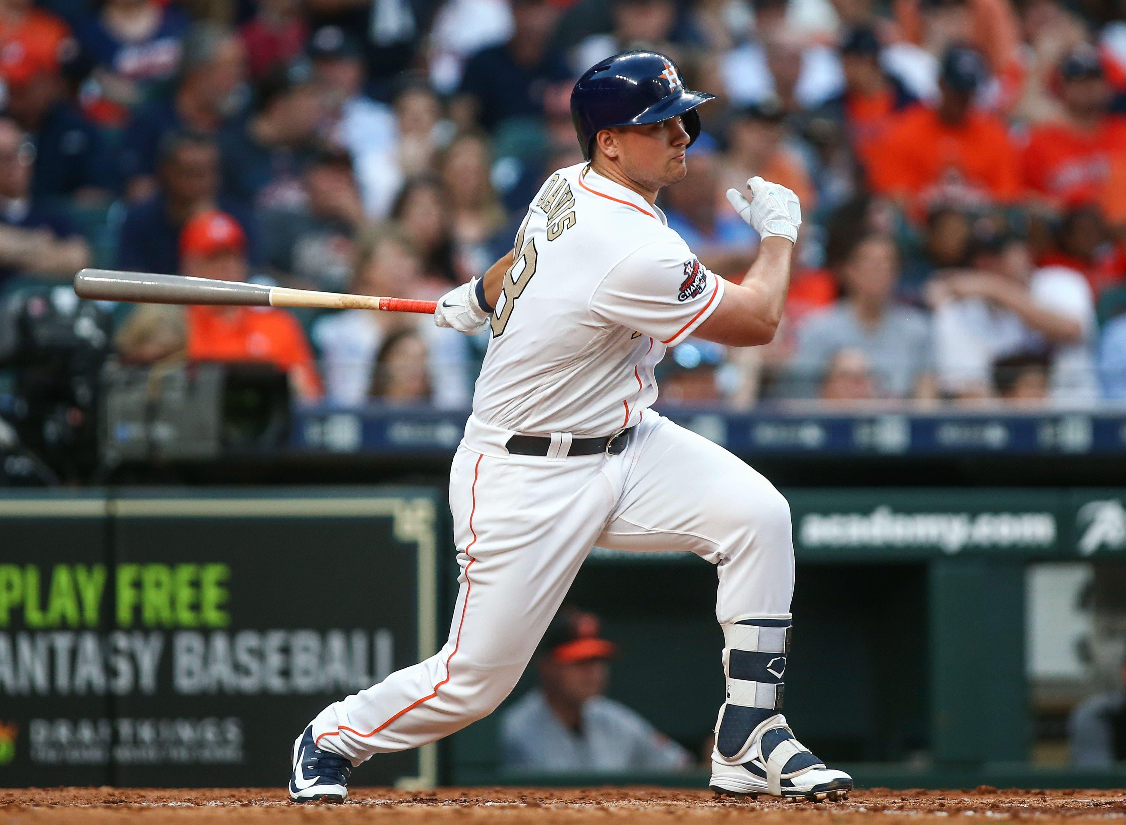 Houston Astros third baseman J.D. Davis bats during the game against the Baltimore Orioles at Minute Maid Park. / Troy Taormina/USA TODAY Sports