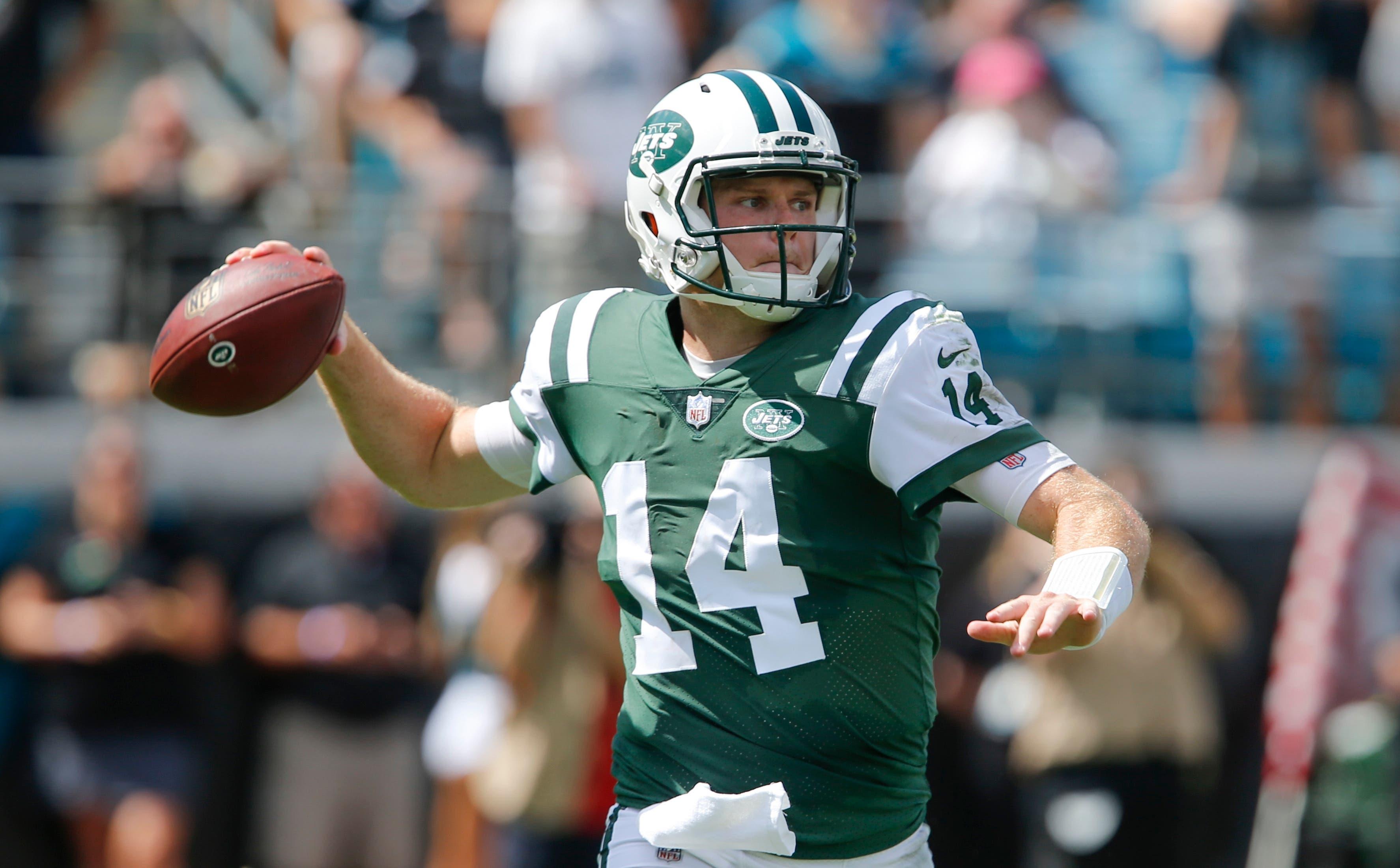 Sep 30, 2018; Jacksonville, FL, USA; New York Jets quarterback Sam Darnold (14) drops back to pass during the second quarter against the Jacksonville Jaguars at TIAA Bank Field. Mandatory Credit: Reinhold Matay-USA TODAY Sports / Reinhold Matay