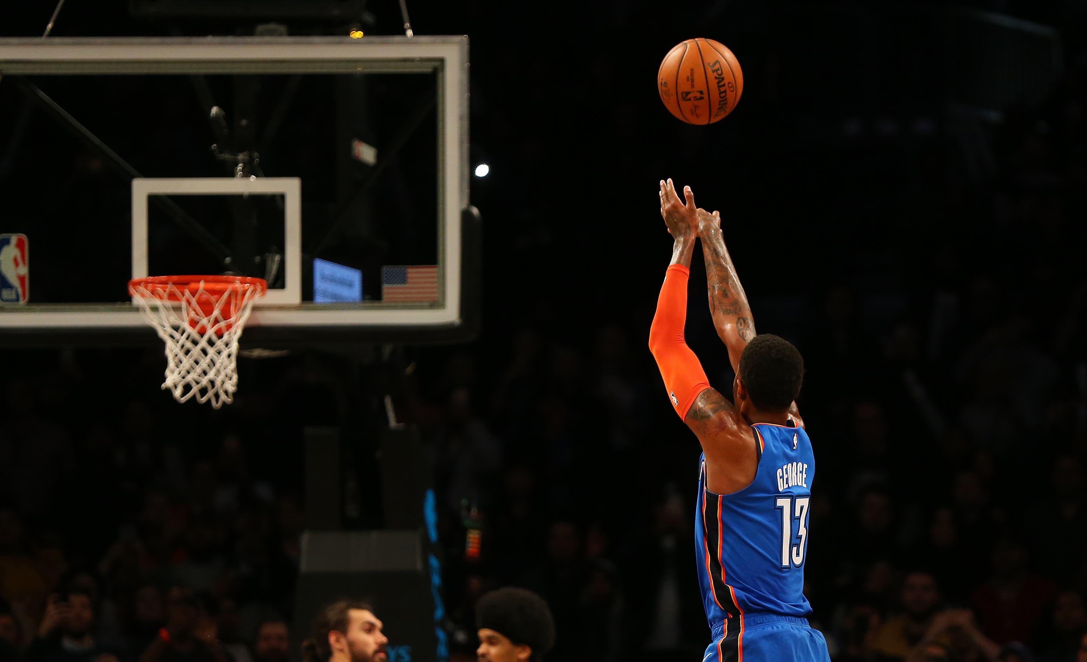 Dec 5, 2018; Brooklyn, NY, USA; Oklahoma City Thunder forward Paul George (13) hits a game winning three point shot to defeat the Brooklyn Nets during the second half at Barclays Center. Mandatory Credit: Andy Marlin-USA TODAY Sports / Andy Marlin