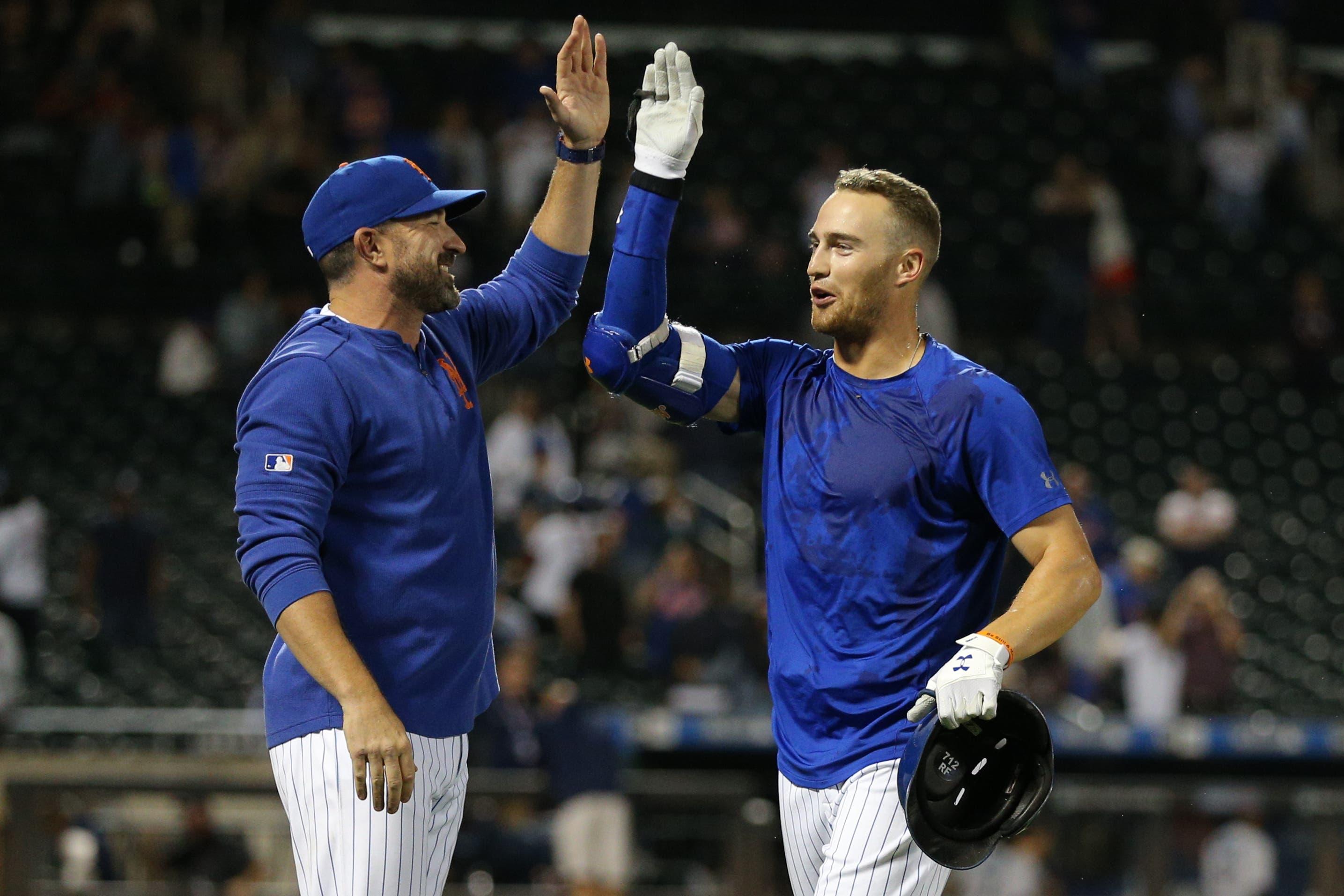 Mets manager Mickey Callaway and OF Brandon Nimmoundefined