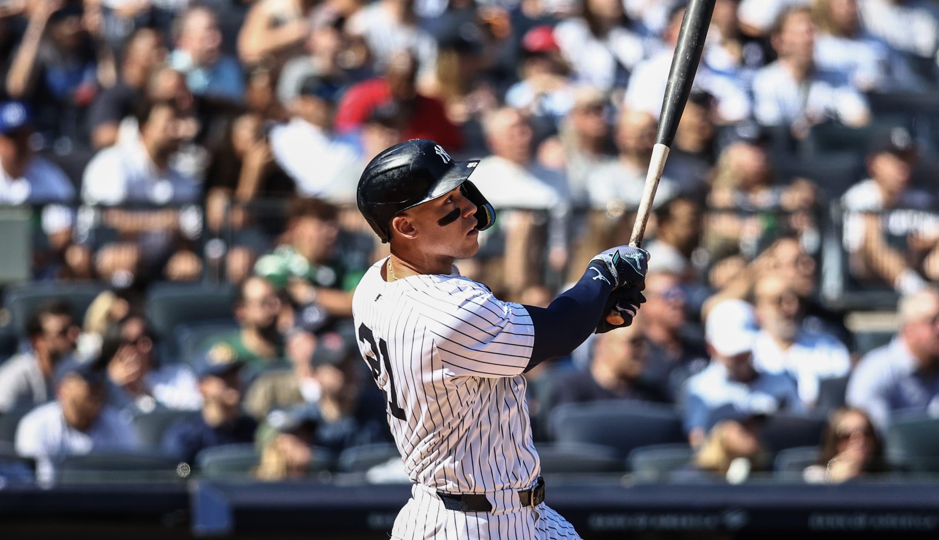 Sep 15, 2024; Bronx, New York, USA; New York Yankees center fielder Aaron Judge (99) hits a two-run home run in the third inning against the Boston Red Sox at Yankee Stadium. Mandatory Credit: Wendell Cruz-Imagn Images