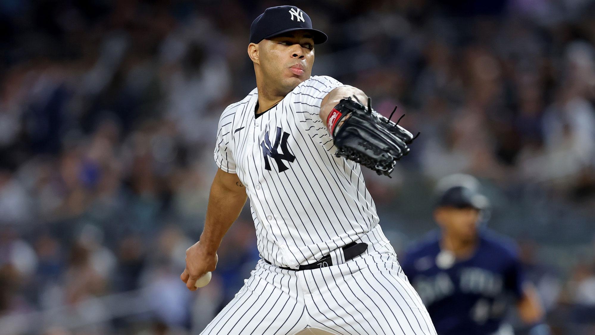 Jun 21, 2023; Bronx, New York, USA; New York Yankees relief pitcher Jimmy Cordero (70) pitches against Seattle Mariners during the sixth inning at Yankee Stadium. / Brad Penner-USA TODAY Sports