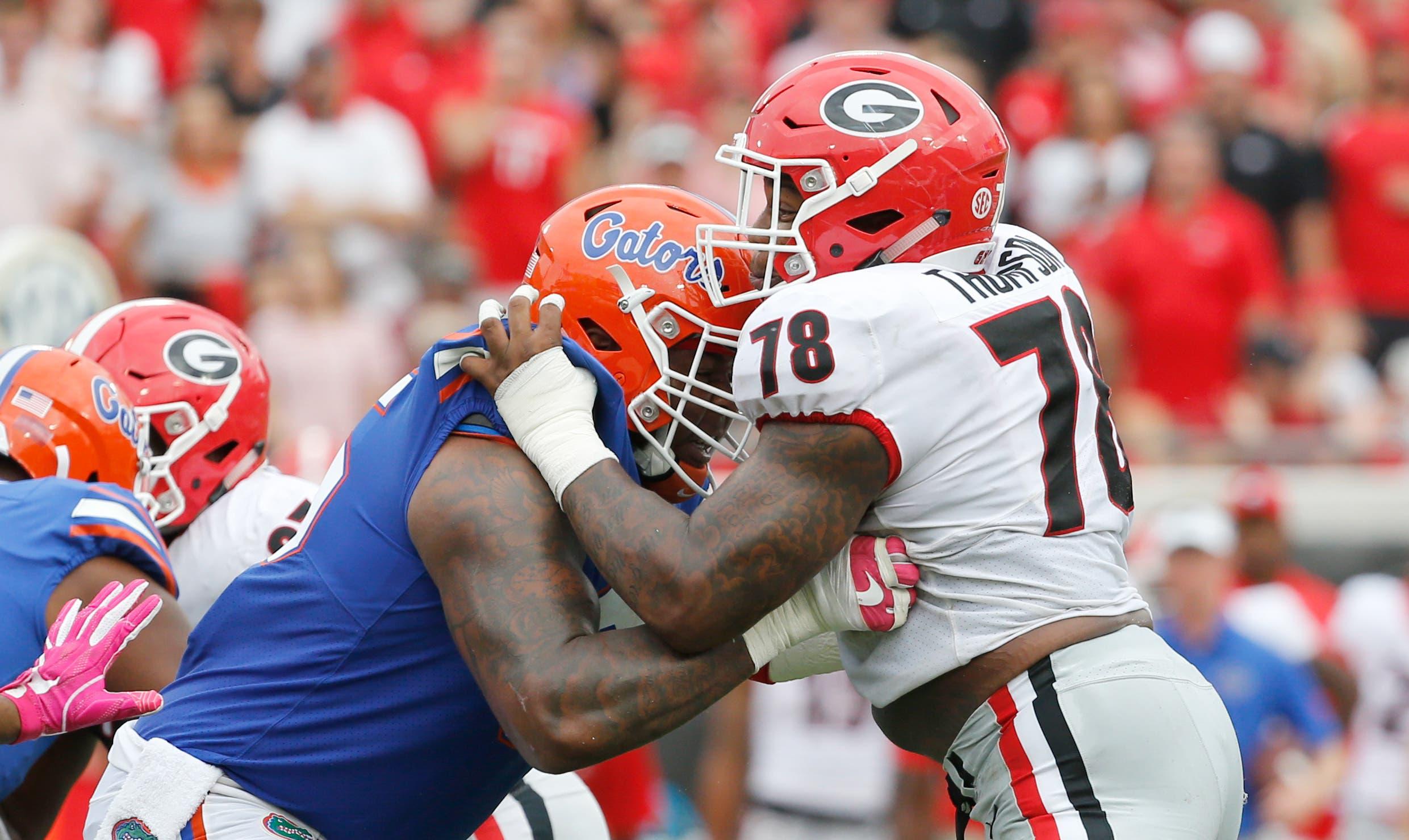 Oct 28, 2017; Jacksonville, FL, USA; Georgia Bulldogs defensive tackle Trenton Thompson (78) rushes as Florida Gators offensive lineman Jawaan Taylor (65) blocks during the first half at EverBank Field. Mandatory Credit: Kim Klement-USA TODAY Sports / Kim Klement