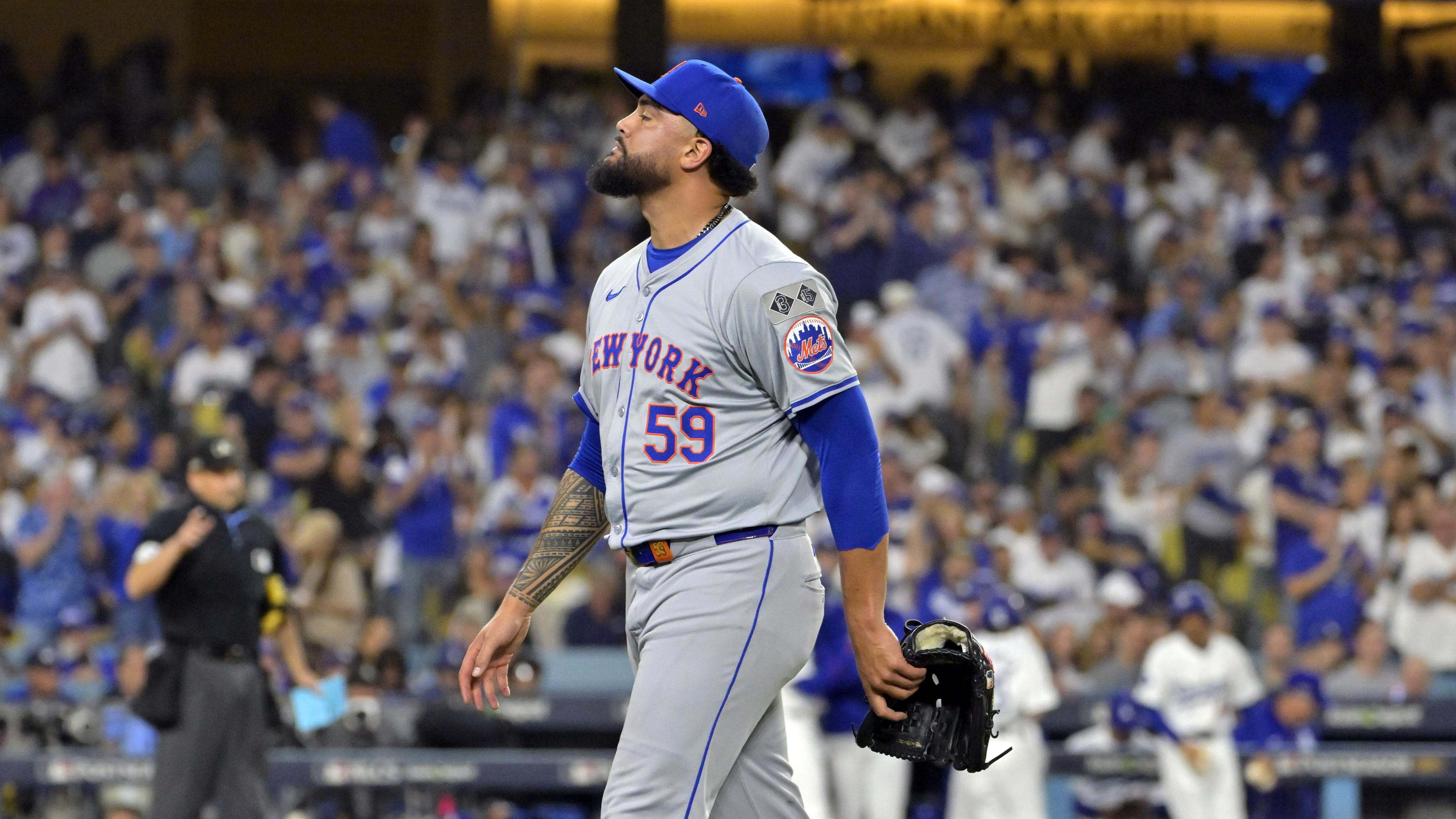 Oct 20, 2024; Los Angeles, California, USA; New York Mets pitcher Sean Manaea (59) walks to the dugout after being relieved in the third inning against the Los Angeles Dodgers during game six of the NLCS for the 2024 MLB playoffs at Dodger Stadium. Mandatory Credit: Jayne Kamin-Oncea-Imagn Images