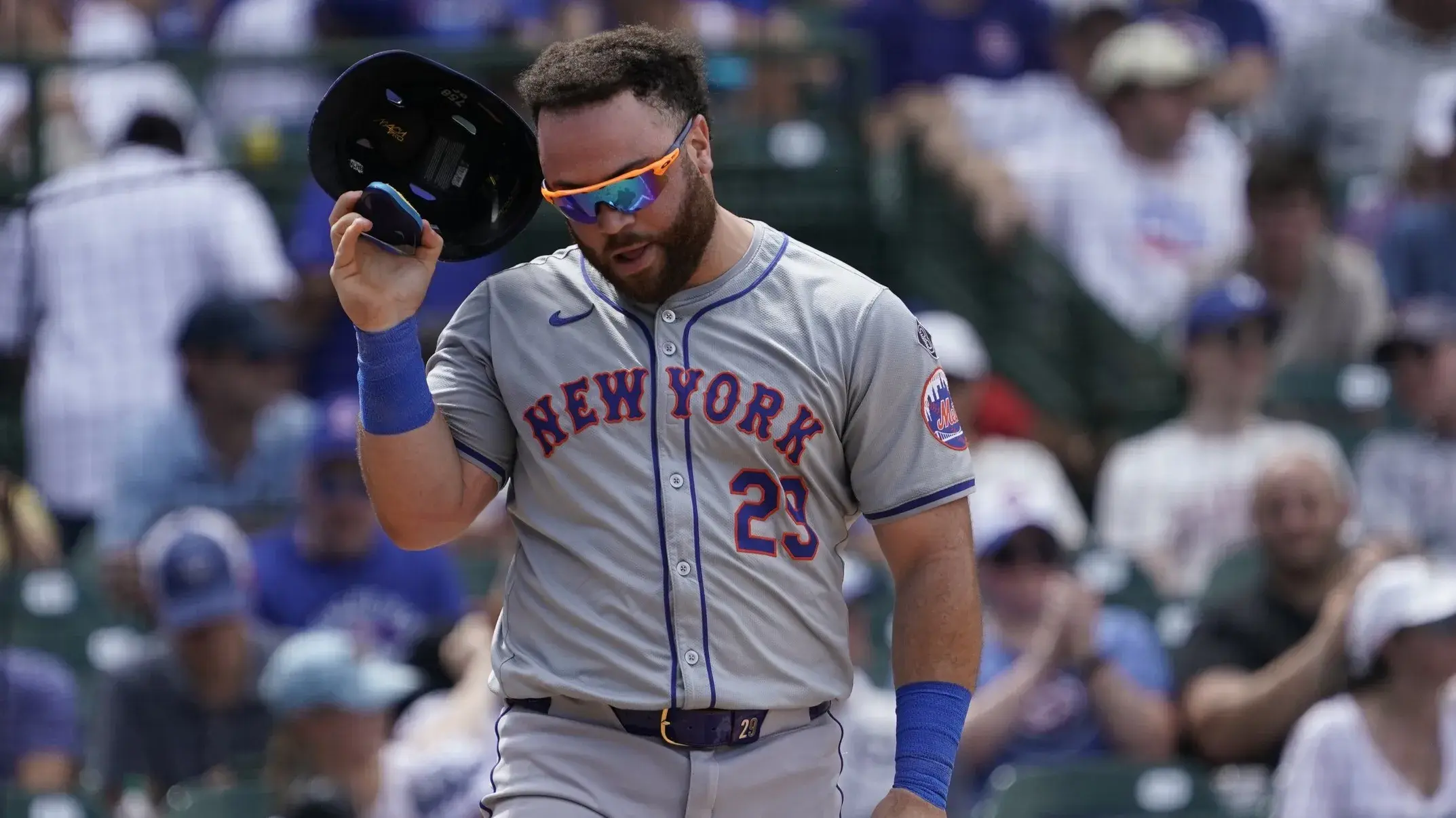 Jun 22, 2024; Chicago, Illinois, USA; New York Mets pitcher David Peterson (23) reacts after being called out on strikes against the Chicago Cubs during the sixth inning at Wrigley Field. / David Banks-USA TODAY Sports