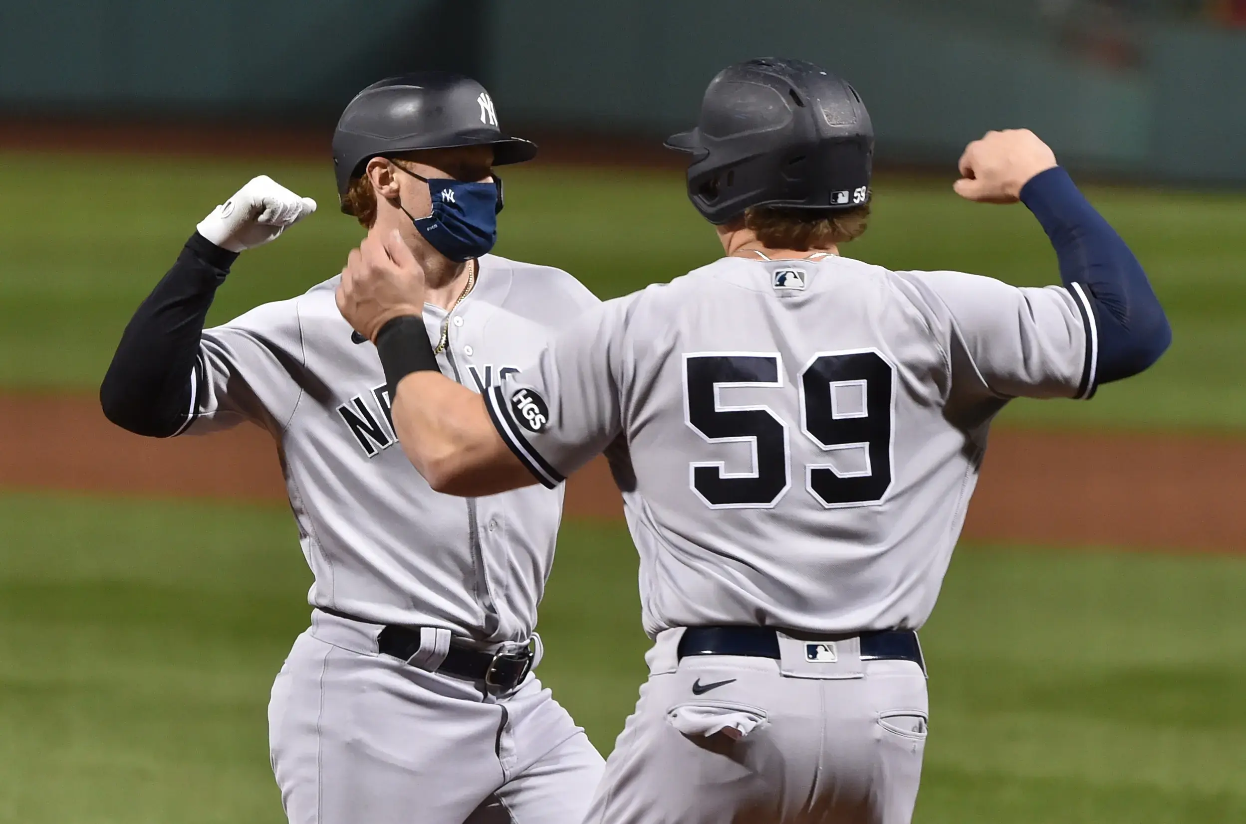 Sep 19, 2020; Boston, Massachusetts, USA; New York Yankees left fielder Clint Frazier (77) reacts with first baseman Luke Voit (59) after hitting a two run home run during the fifth inning against the Boston Red Sox at Fenway Park. Mandatory Credit: Bob DeChiara-USA TODAY Sports / © Bob DeChiara-USA TODAY Sports