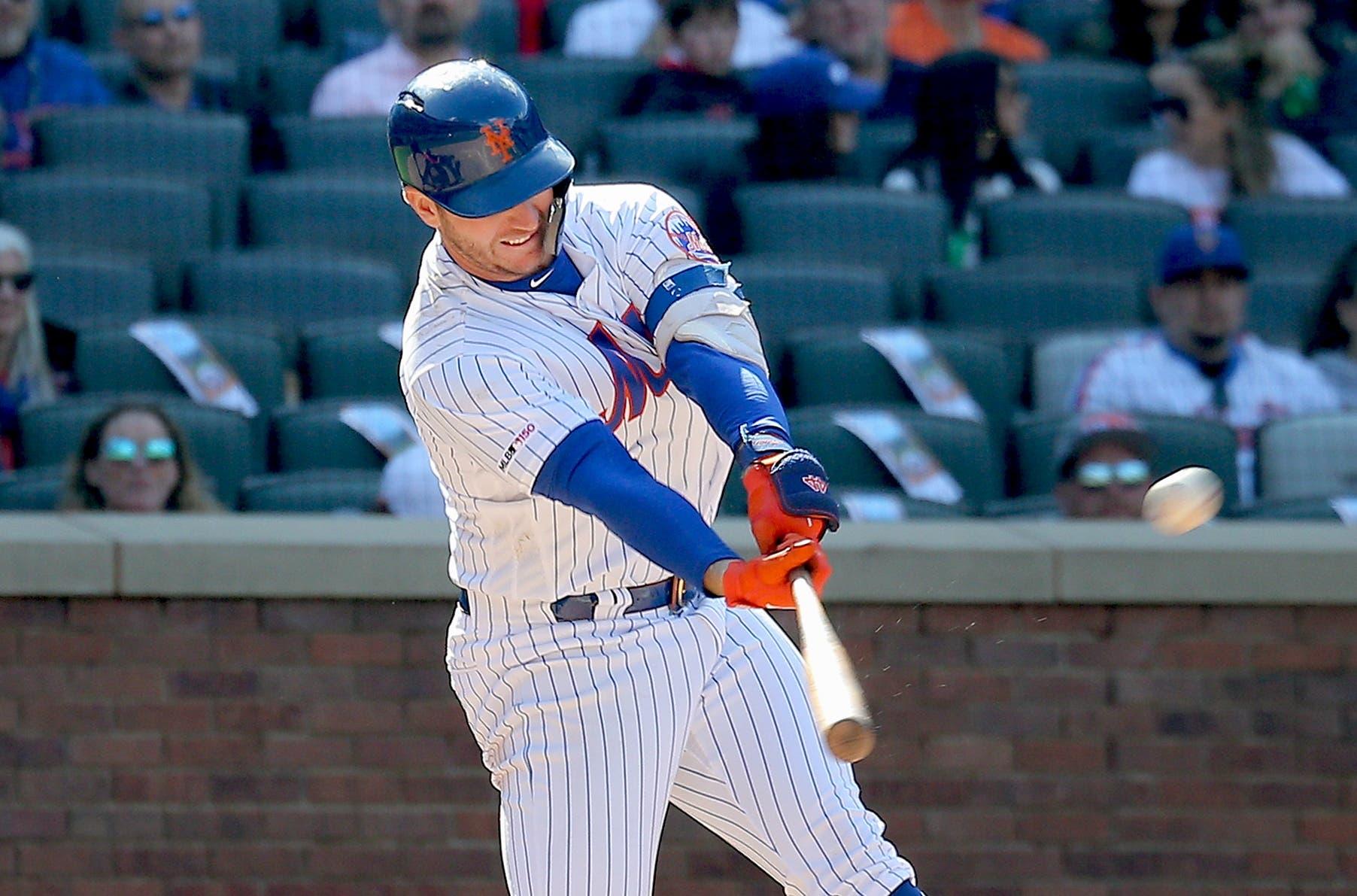 New York Mets first baseman Pete Alonso hits a solo home run against the Washington Nationals during the eighth inning at Citi Field. / Andy Marlin/USA TODAY Sports