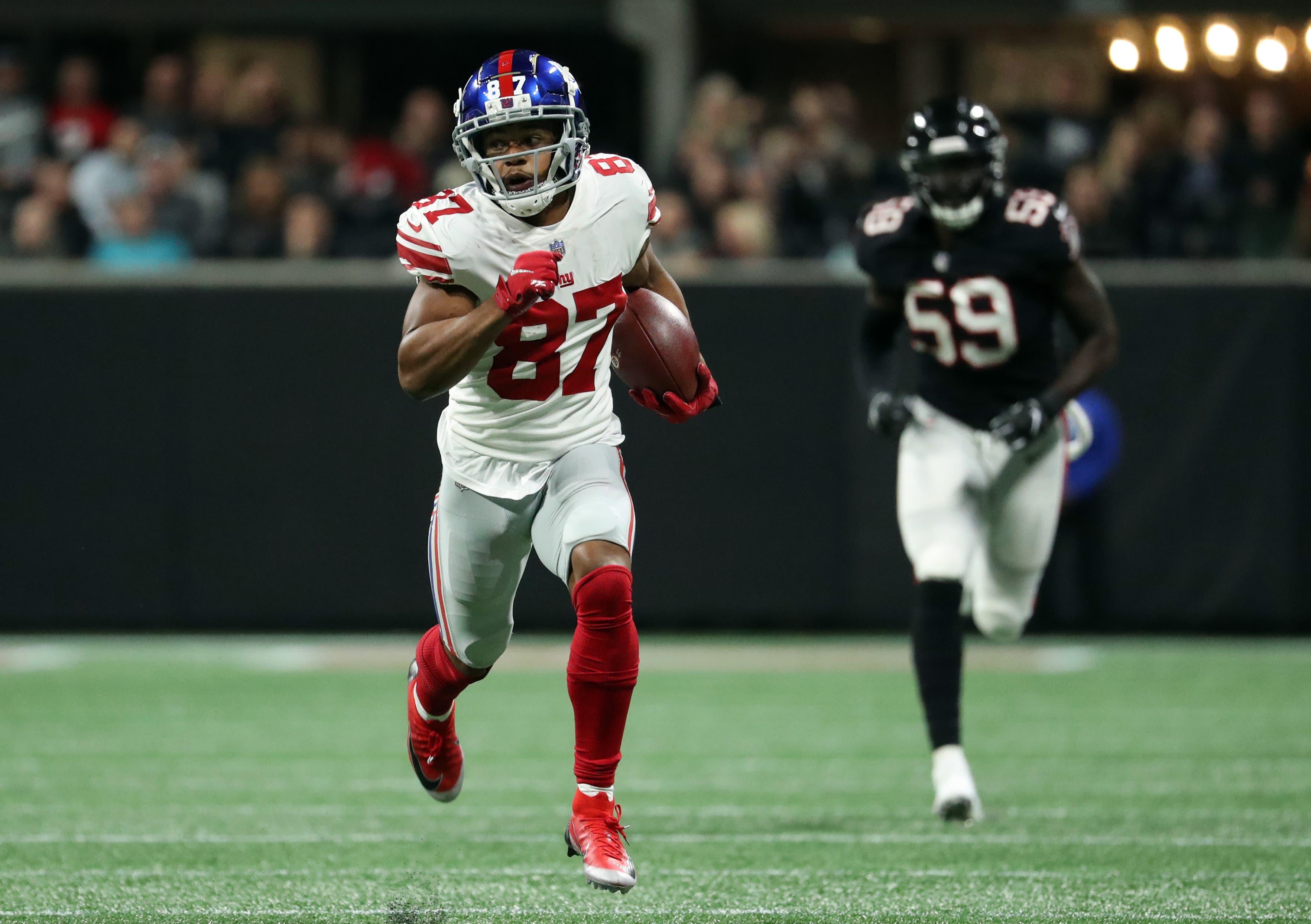 Oct 22, 2018; Atlanta, GA, USA; New York Giants wide receiver Sterling Shepard (87) runs after a catch in the third quarter against the Atlanta Falcons at Mercedes-Benz Stadium. Mandatory Credit: Jason Getz-USA TODAY Sports / Jason Getz