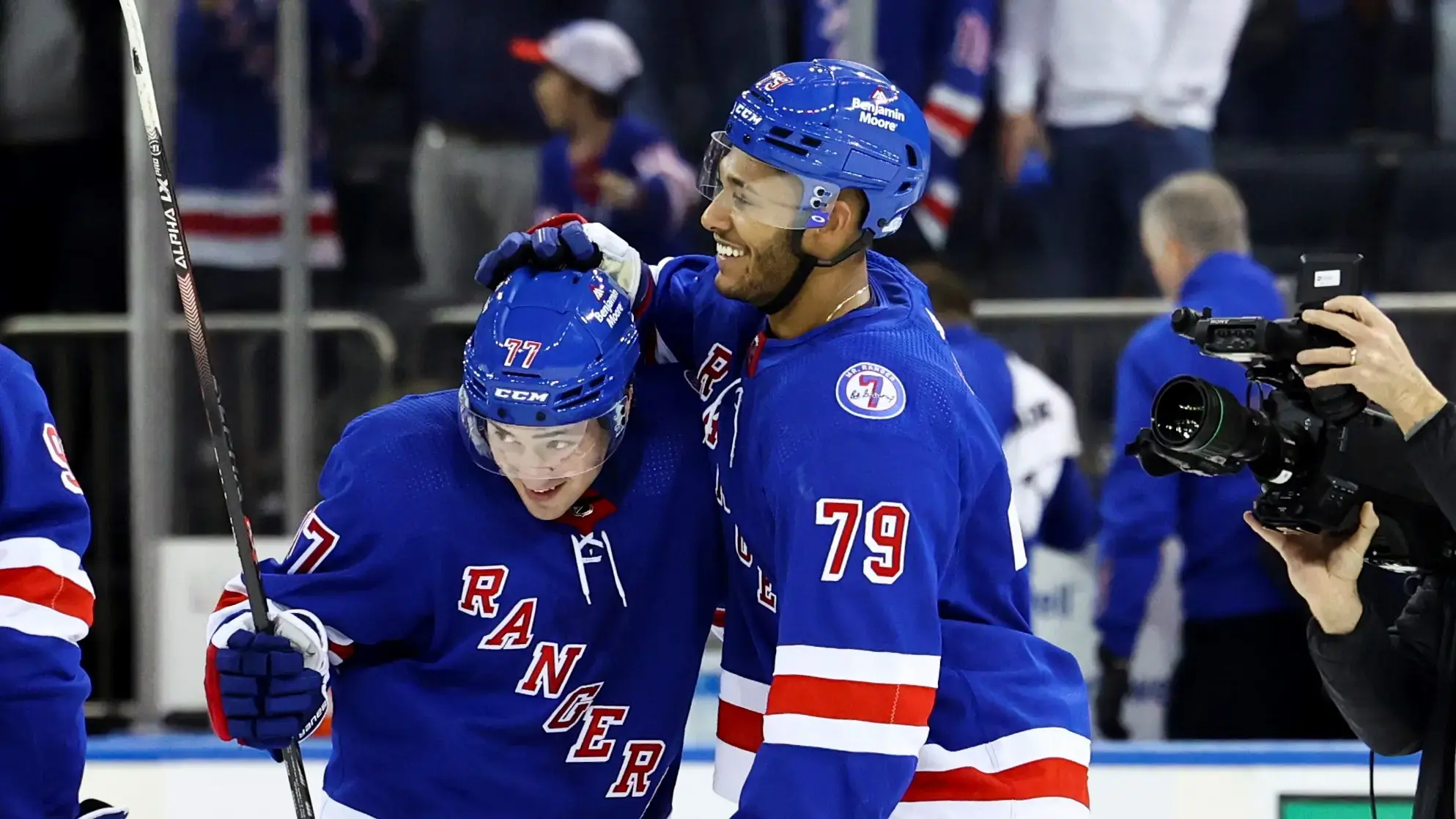 Mar 27, 2022; New York, New York, USA; New York Rangers center Frank Vatrano (77) and New York Rangers defenseman K'Andre Miller (79) embrace after winning the game against the Buffalo Sabres in overtime at Madison Square Garden. Mandatory Credit: Jessica Alcheh-USA TODAY Sports / Jessica Alcheh-USA TODAY Sports