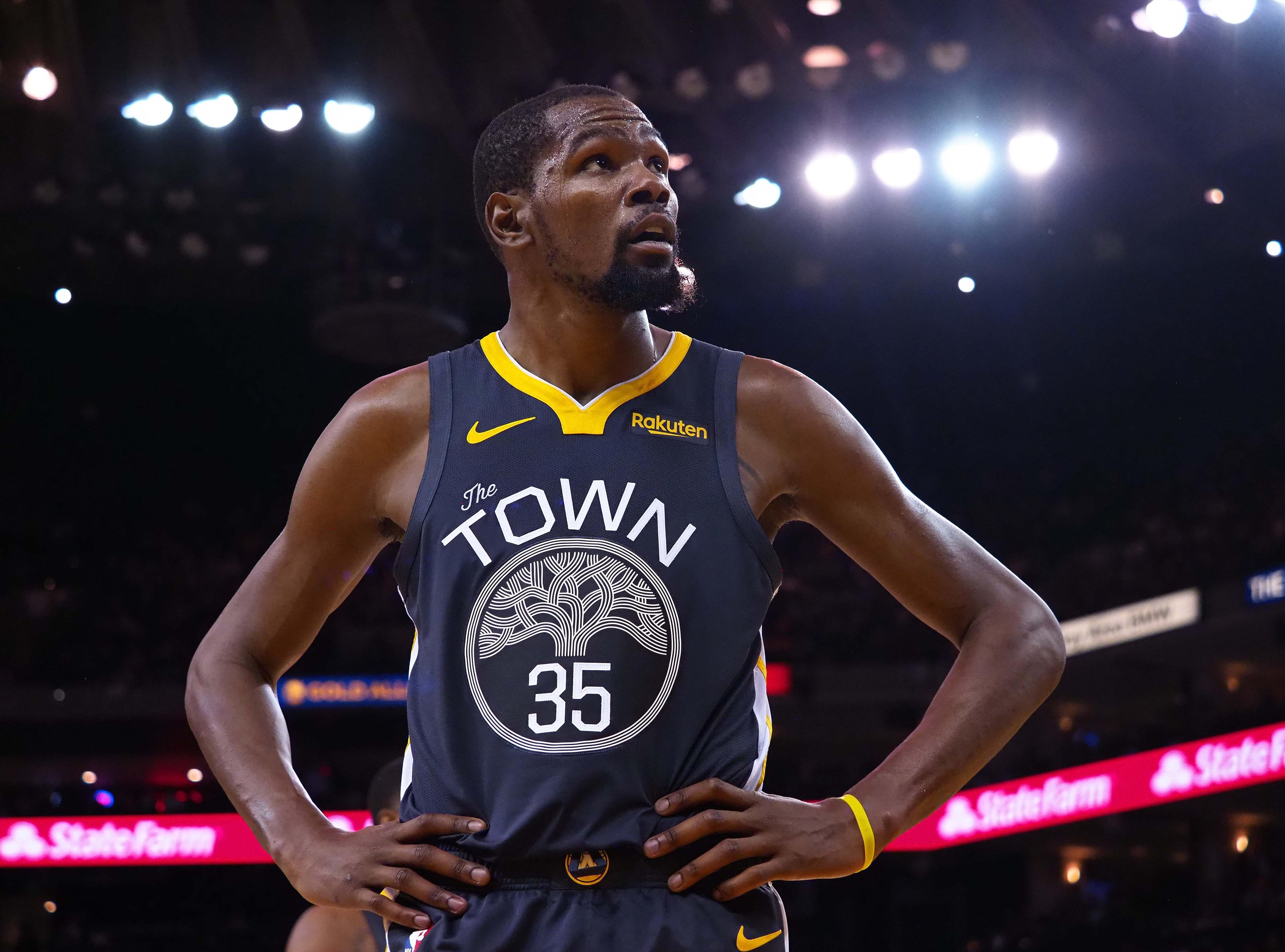 Golden State Warriors forward Kevin Durant between plays against the Portland Trail Blazers during the fourth quarter at Oracle Arena.