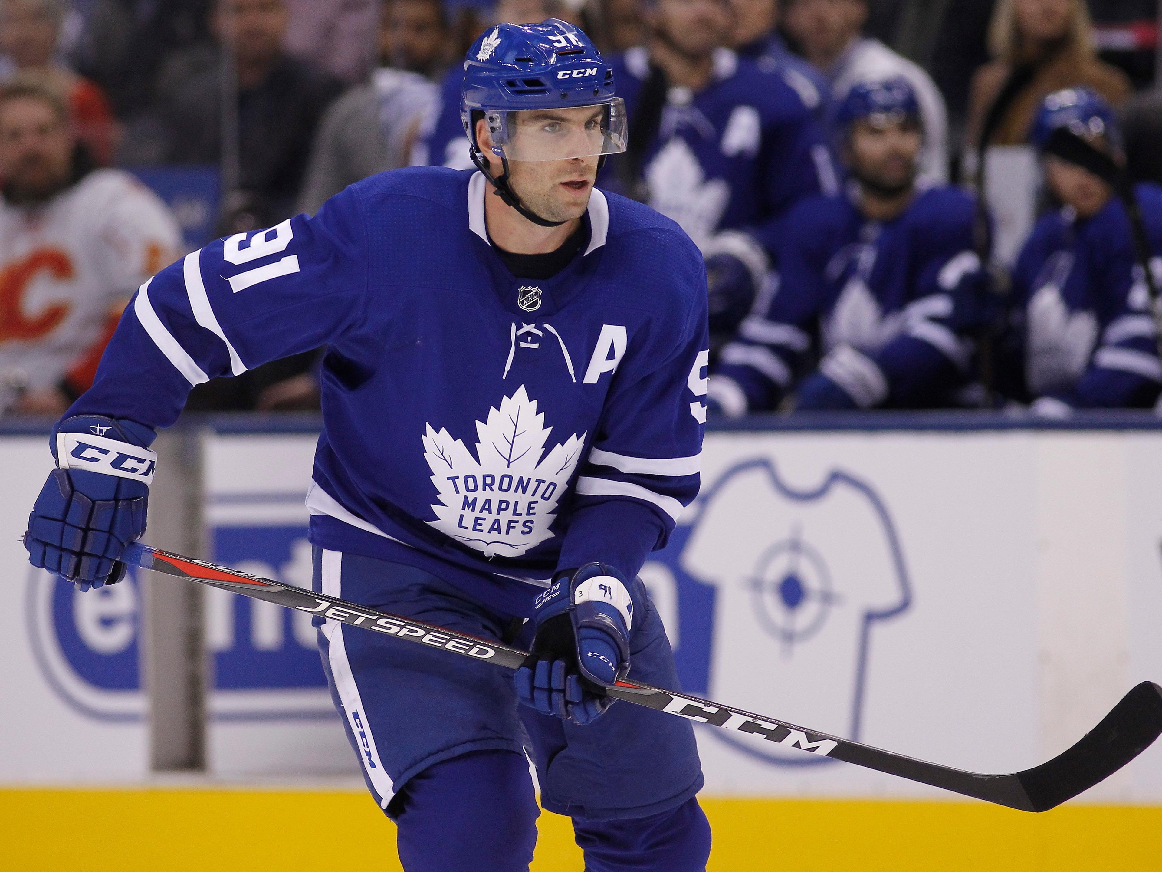 Oct 29, 2018; Toronto, Ontario, CAN; Toronto Maple Leafs forward John Tavares (91) skates against the Calgary Flames at Scotiabank Arena. Calgary defeated Toronto. Mandatory Credit: John E. Sokolowski-USA TODAY Sports