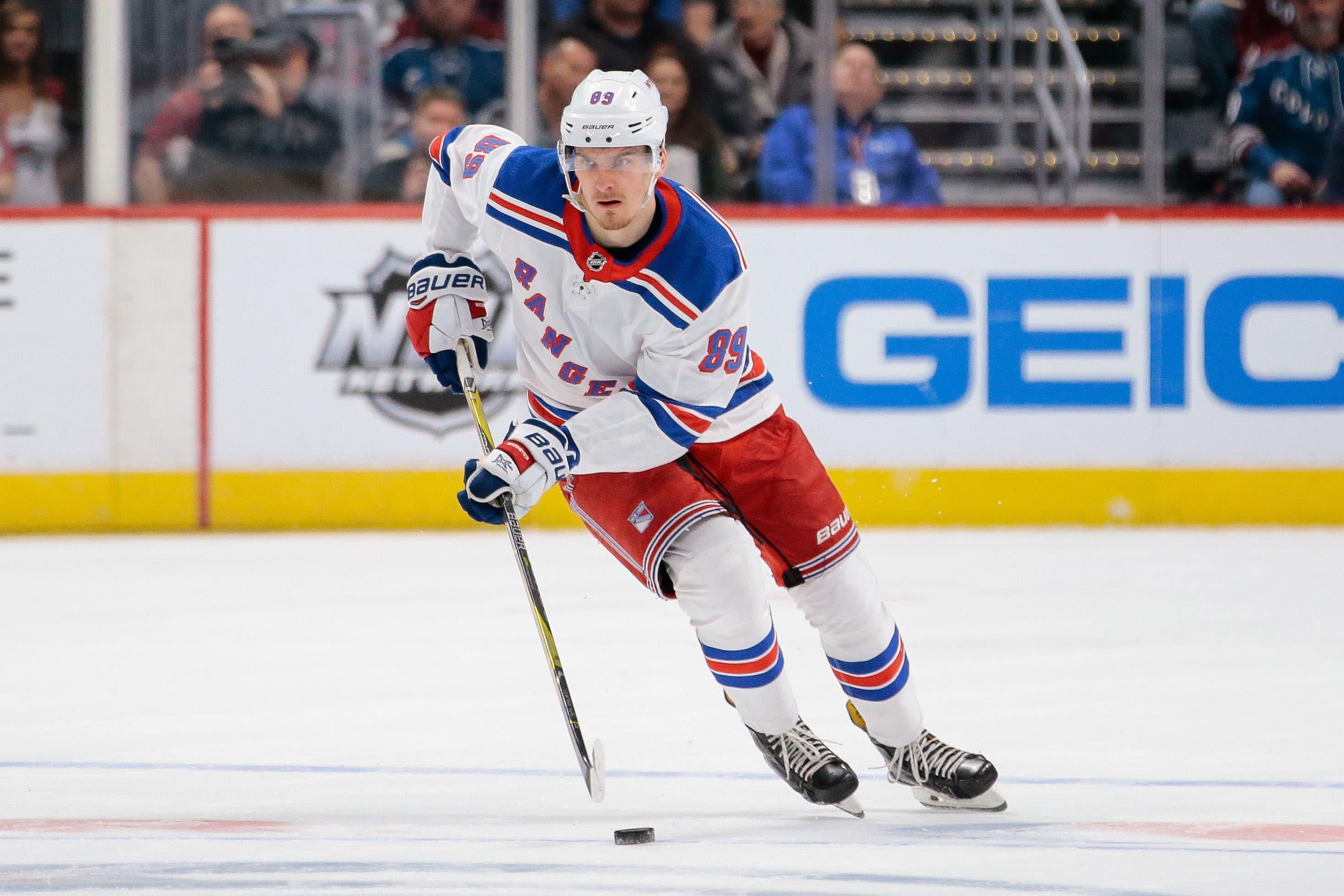 Jan 20, 2018; Denver, CO, USA; New York Rangers right wing Pavel Buchnevich (89) controls the puck in the first period against the Colorado Avalanche at the Pepsi Center. Mandatory Credit: Isaiah J. Downing-USA TODAY Sports / Isaiah J. Downing