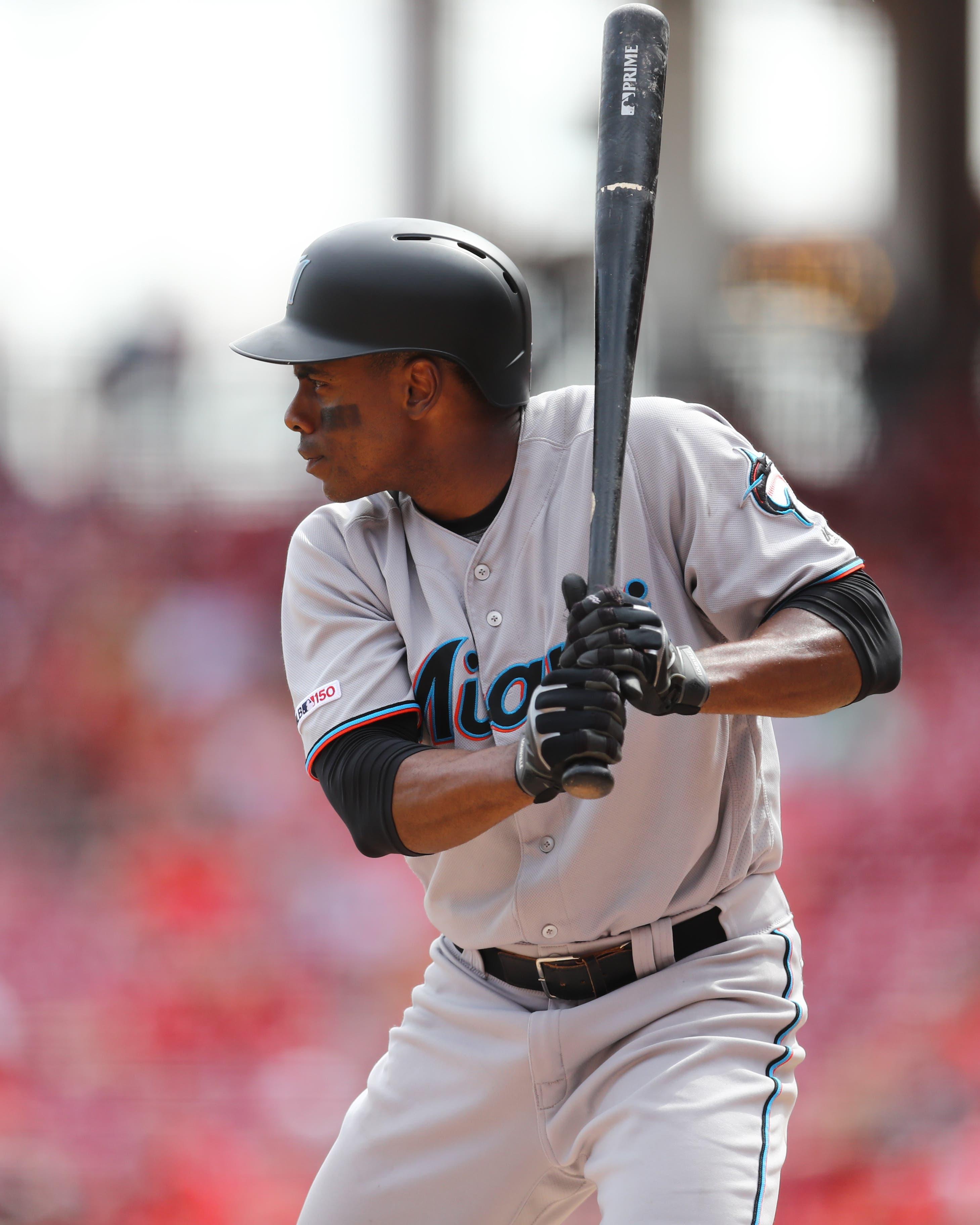 Apr 11, 2019; Cincinnati, OH, USA; Miami Marlins left fielder Curtis Granderson (21) against the Cincinnati Reds at Great American Ball Park. Mandatory Credit: Aaron Doster-USA TODAY Sports / Aaron Doster