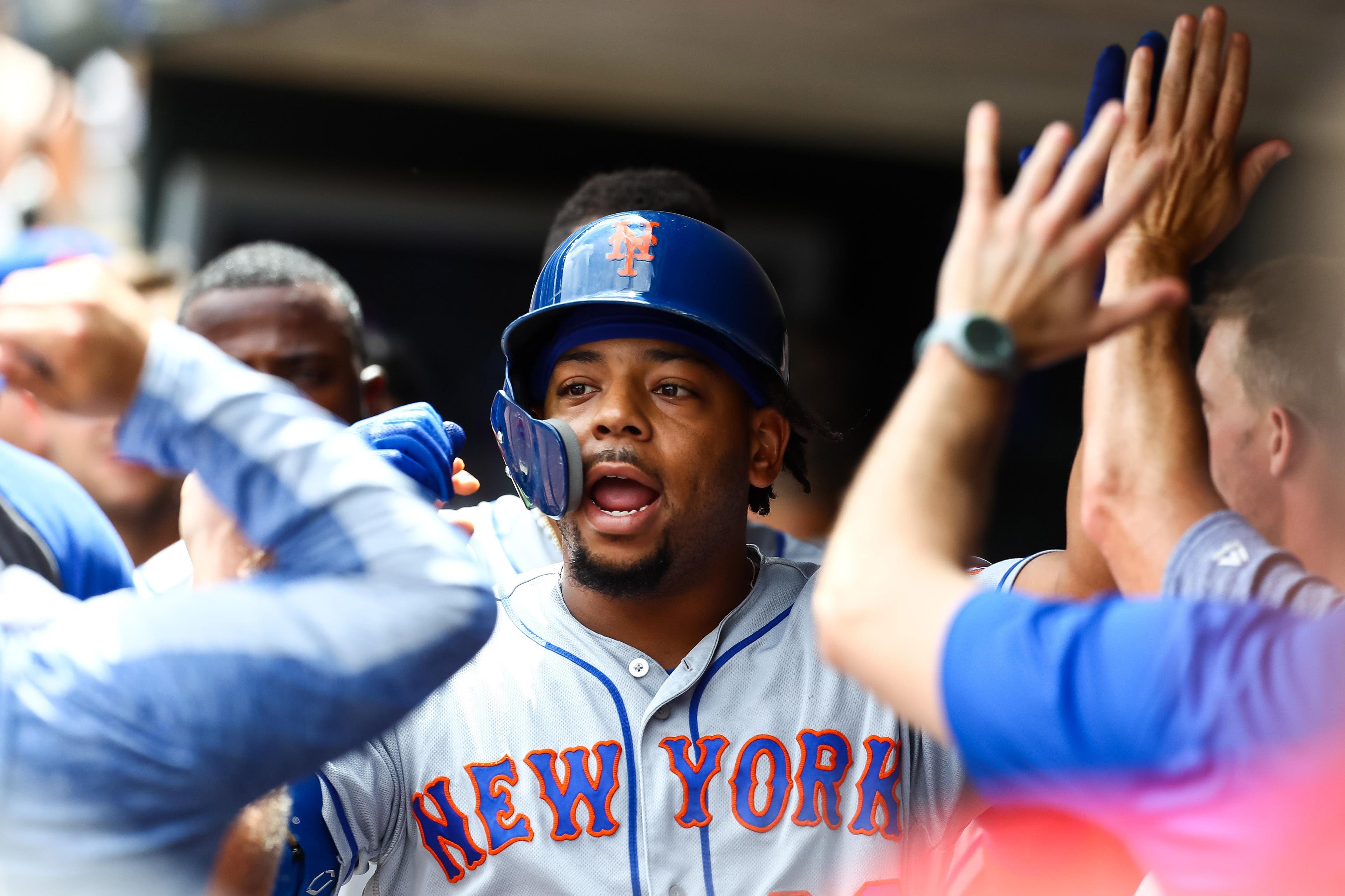 Jul 17, 2019; Minneapolis, MN, USA; New York Mets pinch hitter Dominic Smith (22) celebrates after hitting a three run home run against the Minnesota Twins in the seventh inning at Target Field. Mandatory Credit: David Berding-USA TODAY Sports / David Berding