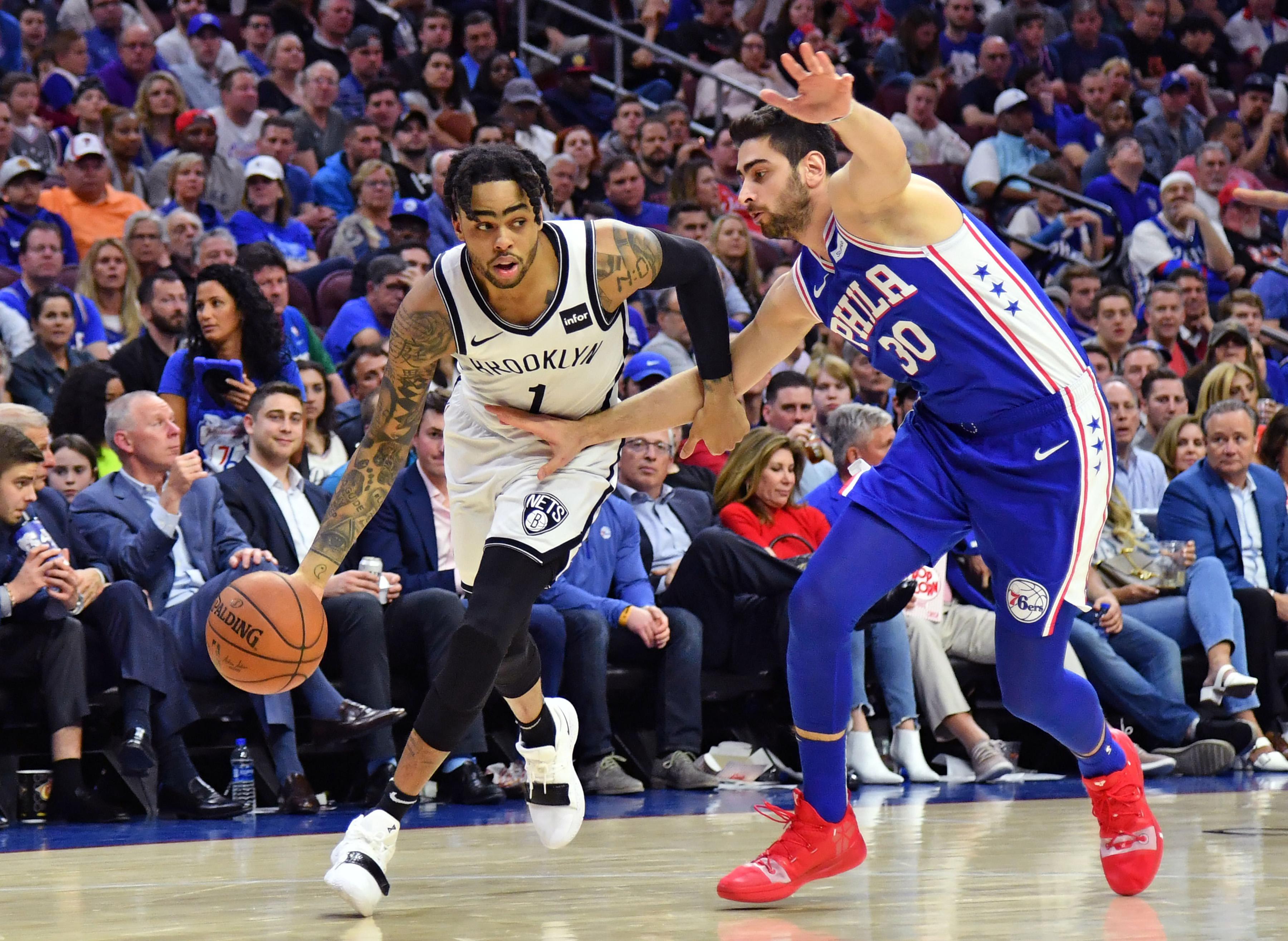 Apr 23, 2019; Philadelphia, PA, USA; Brooklyn Nets guard D'Angelo Russell (1) drives to the basket against Philadelphia 76ers guard Furkan Korkmaz (30) during the third quarter in game five of the first round of the 2019 NBA Playoffs at Wells Fargo Center. Mandatory Credit: Eric Hartline-USA TODAY Sports