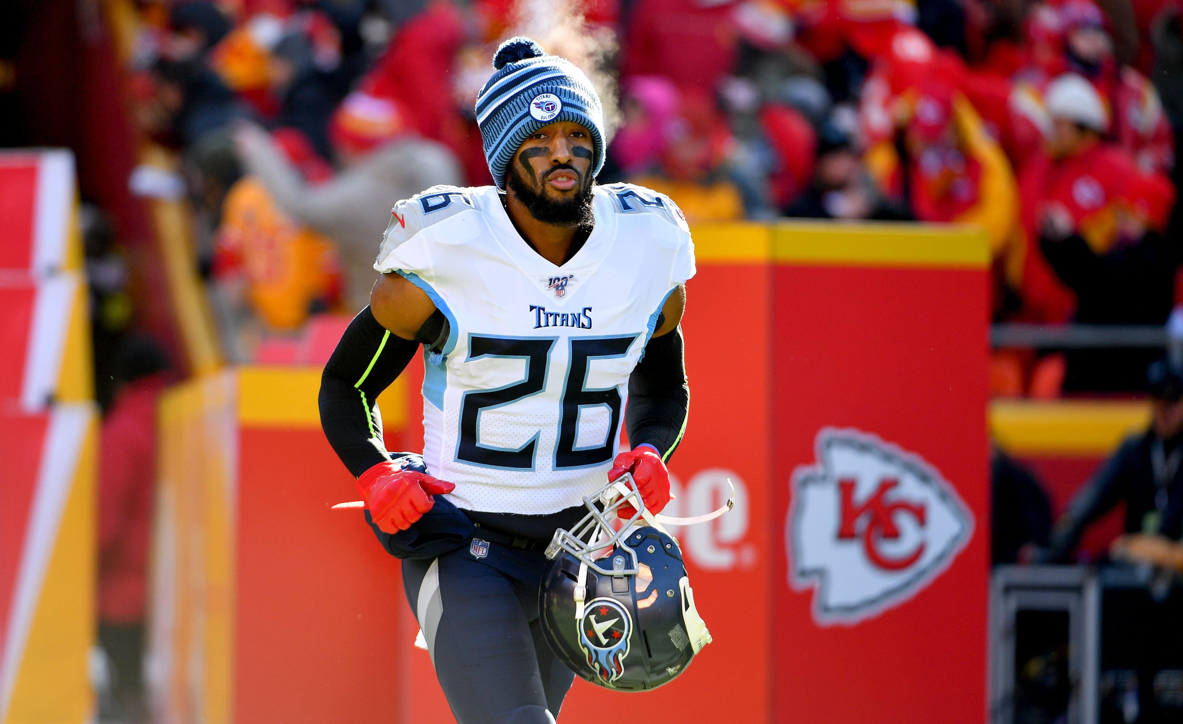 Jan 19, 2020; Kansas City, Missouri, USA; Tennessee Titans cornerback Logan Ryan (26) runs onto the field before the AFC Championship Game against the Kansas City Chiefs at Arrowhead Stadium. Mandatory Credit: Denny Medley-USA TODAY Sports / Denny Medley