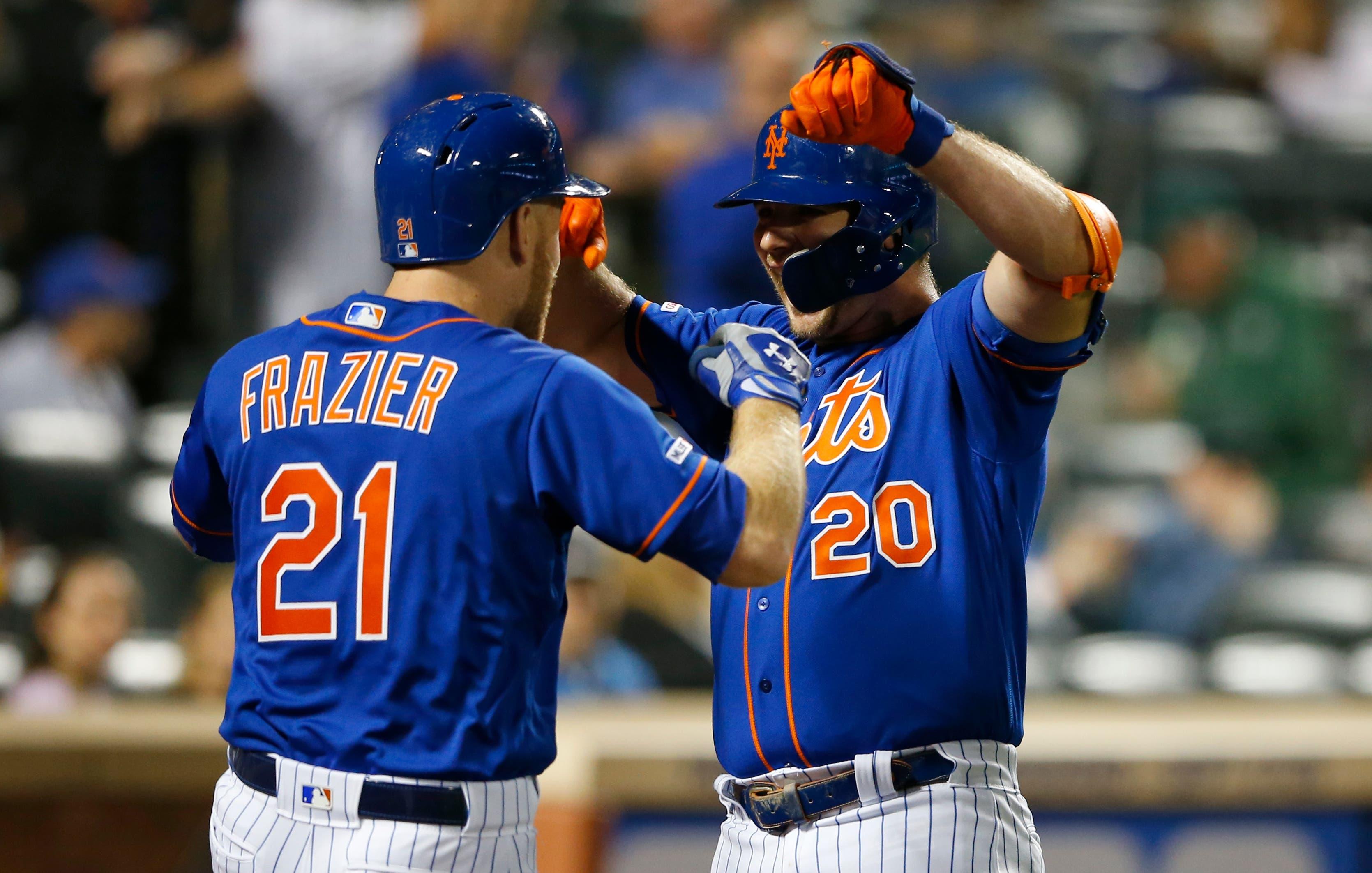 Sep 27, 2019; New York City, NY, USA; New York Mets first baseman Pete Alonso (20) celebrates with third baseman Todd Frazier (21) after hitting a home run in the first inning against the Atlanta Braves at Citi Field. Mandatory Credit: Noah K. Murray-USA TODAY Sports / Noah K. Murray