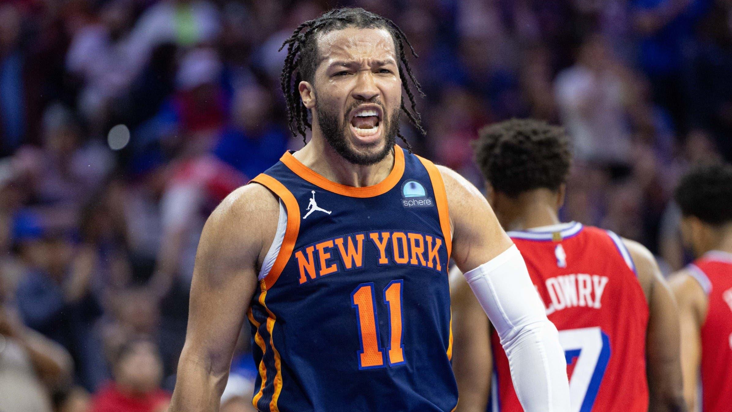 Apr 28, 2024; Philadelphia, Pennsylvania, USA; New York Knicks guard Jalen Brunson (11) reacts after scoring against the Philadelphia 76ers during the fourth quarter of game four of the first round in the 2024 NBA playoffs at Wells Fargo Center. / Bill Streicher-USA TODAY Sports