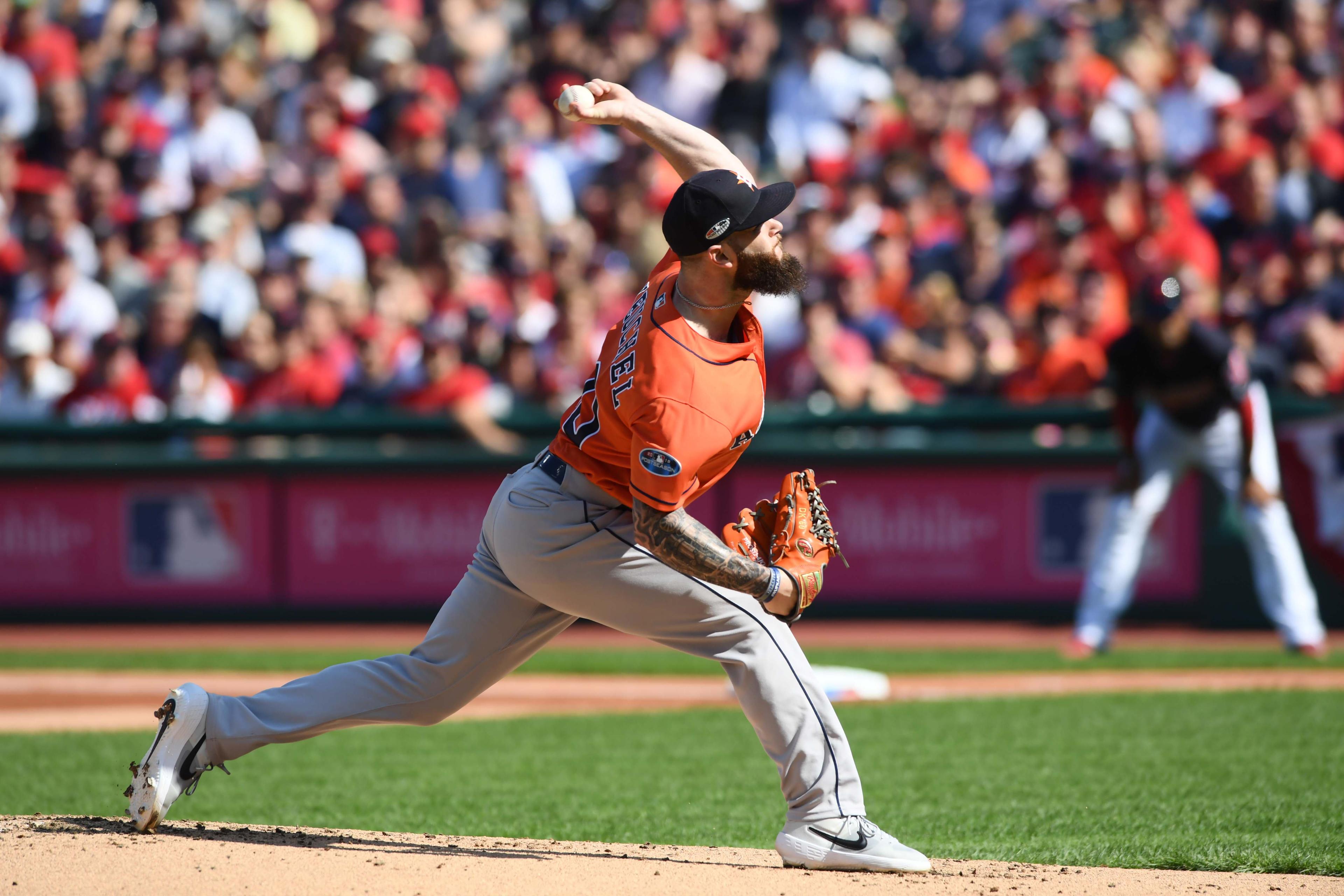 Oct 8, 2018; Cleveland, OH, USA; Houston Astros starting pitcher Dallas Keuchel (60) throws out a pitch in the first inning against the Cleveland Indians during game three of the 2018 ALDS playoff baseball series at Progressive Field. Mandatory Credit: Ken Blaze-USA TODAY Sports / Ken Blaze