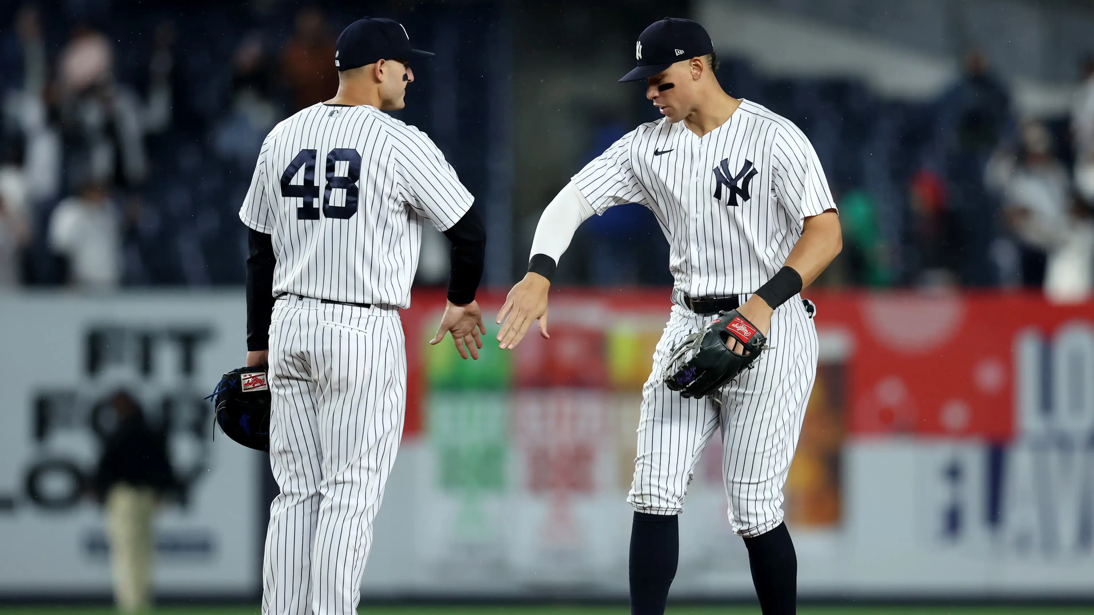New York Yankees first baseman Anthony Rizzo (48) and center fielder Aaron Judge (99) celebrate after defeating the Baltimore Orioles at Yankee Stadium. / Brad Penner-USA TODAY Sports