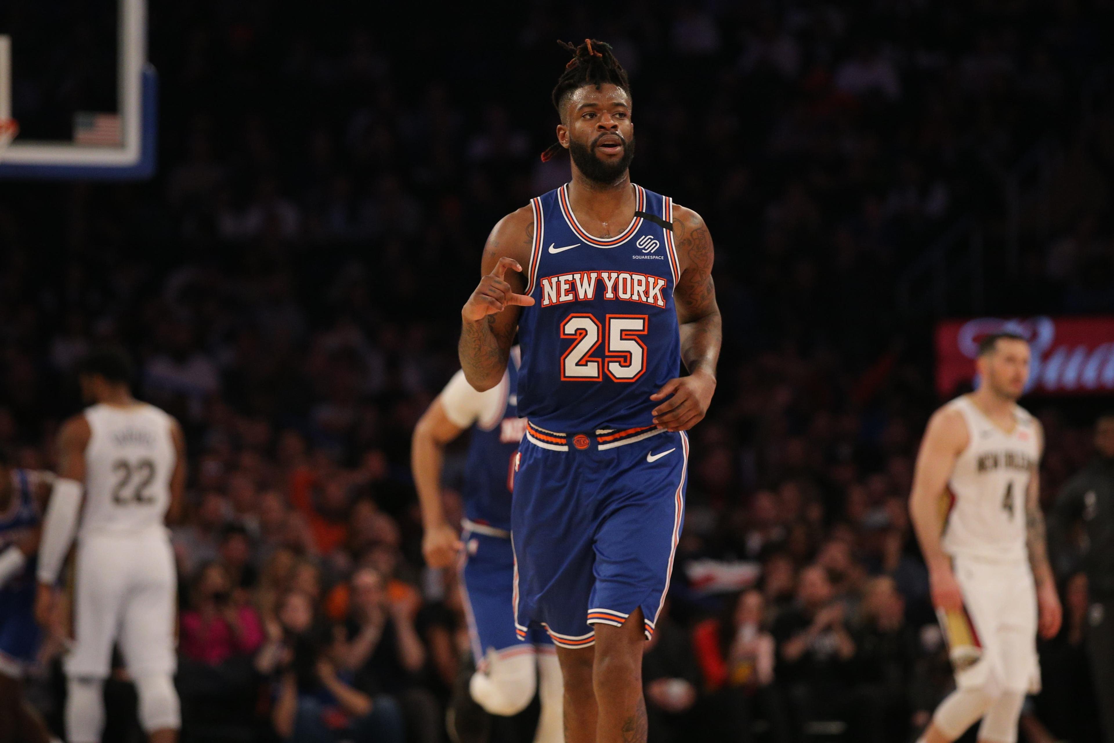 Jan 10, 2020; New York, New York, USA; New York Knicks shooting guard Reggie Bullock (25) reacts after a three point shot against the New Orleans Pelicans during the second quarter at Madison Square Garden. Mandatory Credit: Brad Penner-USA TODAY Sportsundefined