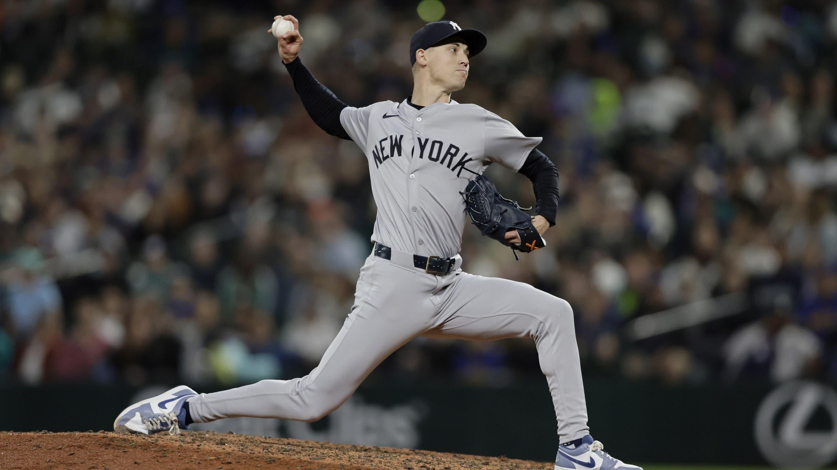 Sep 18, 2024; Seattle, Washington, USA; New York Yankees pitcher Luke Weaver (30) throws against the Seattle Mariners during the eighth inning at T-Mobile Park. / John Froschauer-Imagn Images