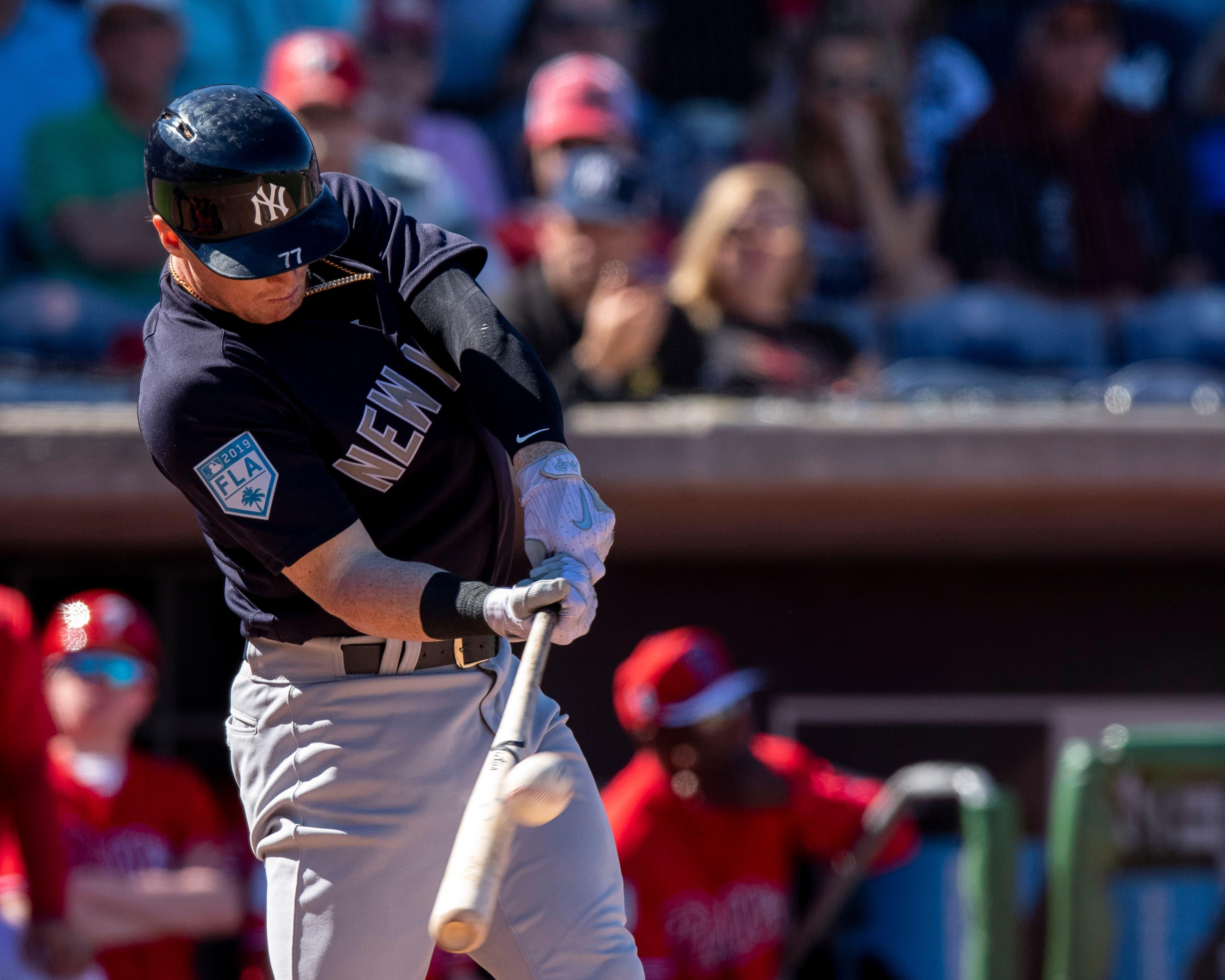 New York Yankees outfielder Clint Frazier hits a sacrifice fly scoring infielder Miguel Andujar during the sixth inning against the Philadelphia Phillies at Spectrum Field. / Douglas DeFelice/USA TODAY Sports