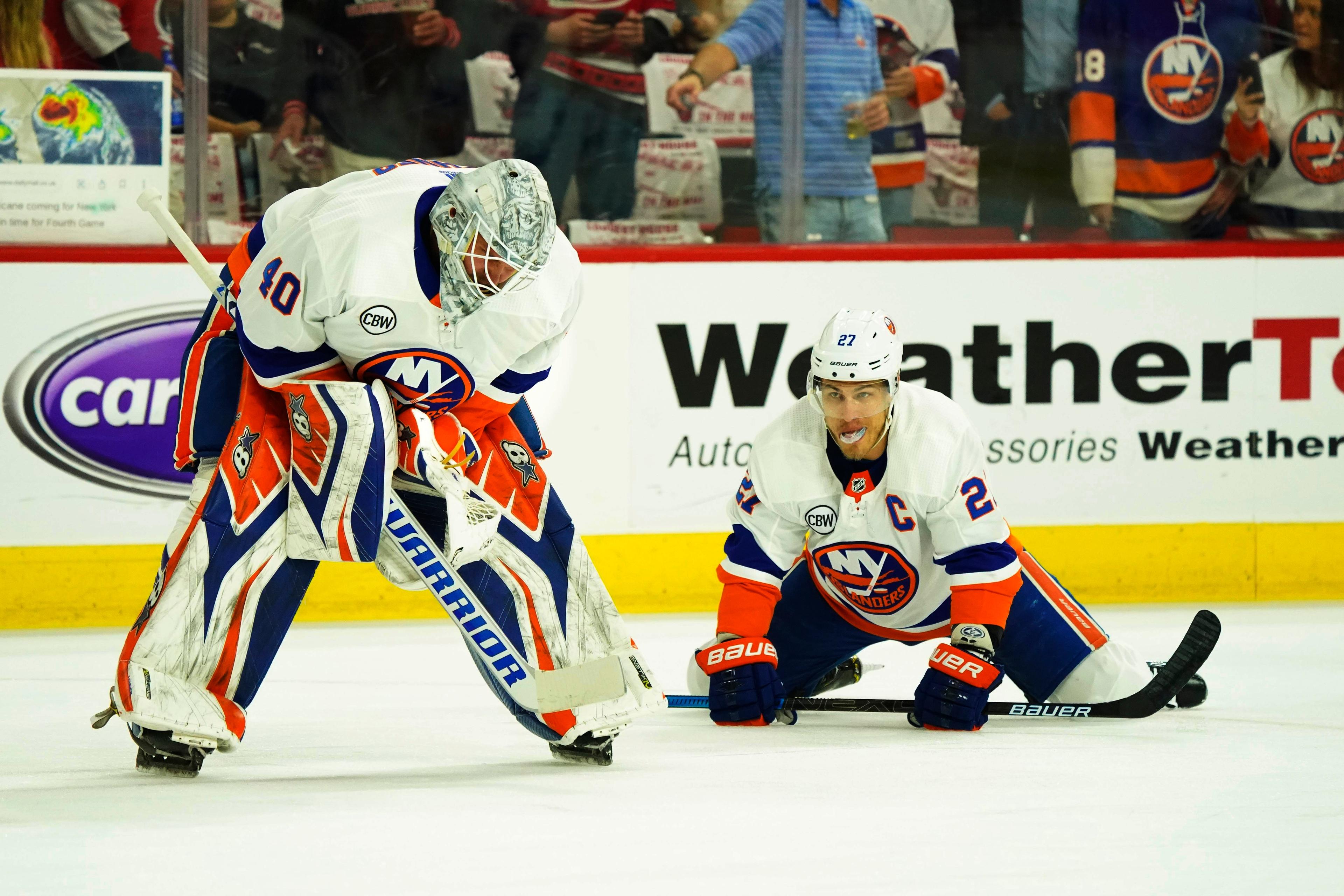 May 3, 2019; Raleigh, NC, USA; New York Islanders goaltender Robin Lehner (40) and left wing Anders Lee (27) looks on during warmups before the game against the Carolina Hurricanes in game four of the second round of the 2019 Stanley Cup Playoffs at PNC Arena. The Carolina Hurricanes defeated the New York Islanders 5-2. Mandatory Credit: James Guillory-USA TODAY Sports