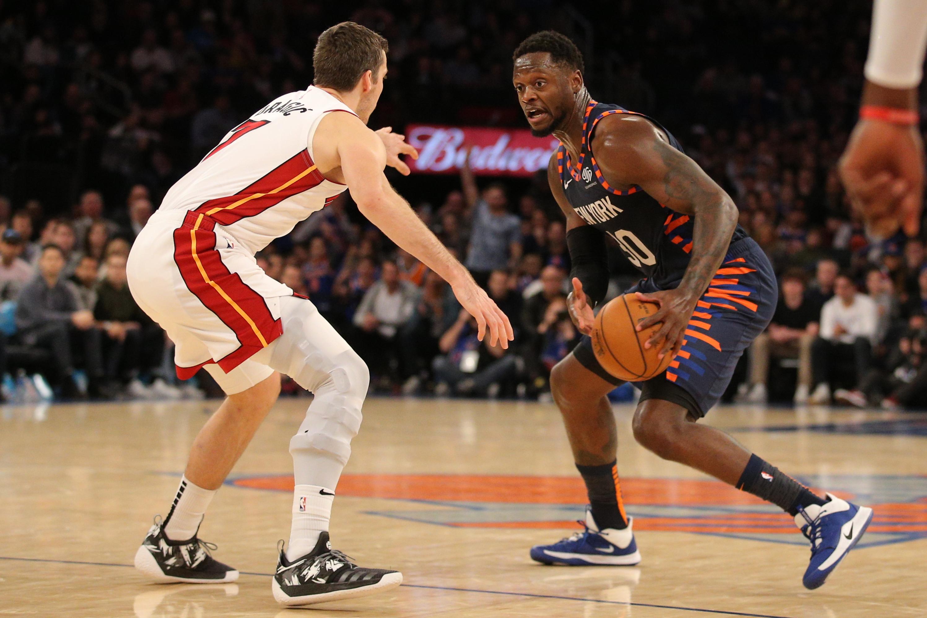 Jan 12, 2020; New York, New York, USA; New York Knicks power forward Julius Randle (30) controls the ball against Miami Heat point guard Goran Dragic (7) during the fourth quarter at Madison Square Garden. Mandatory Credit: Brad Penner-USA TODAY Sports