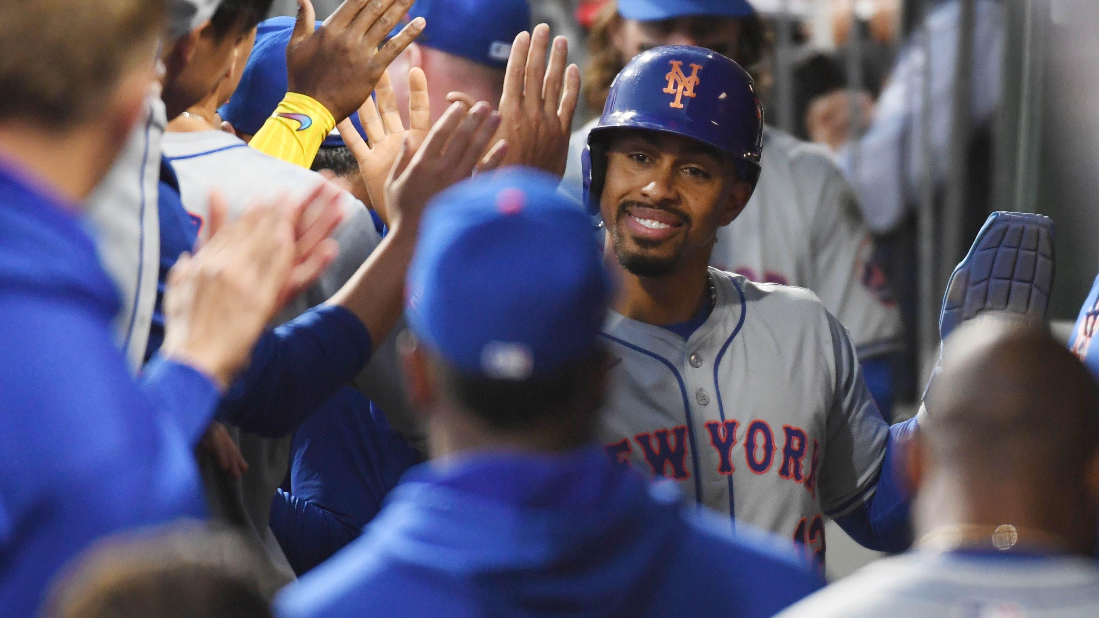 New York Mets shortstop Francisco Lindor (12) celebrates after scoring a run in the eighth inning against the Philadelphia Phillies in game one of the NLDS for the 2024 MLB Playoffs at Citizens Bank Park / Eric Hartline - Imagn Images