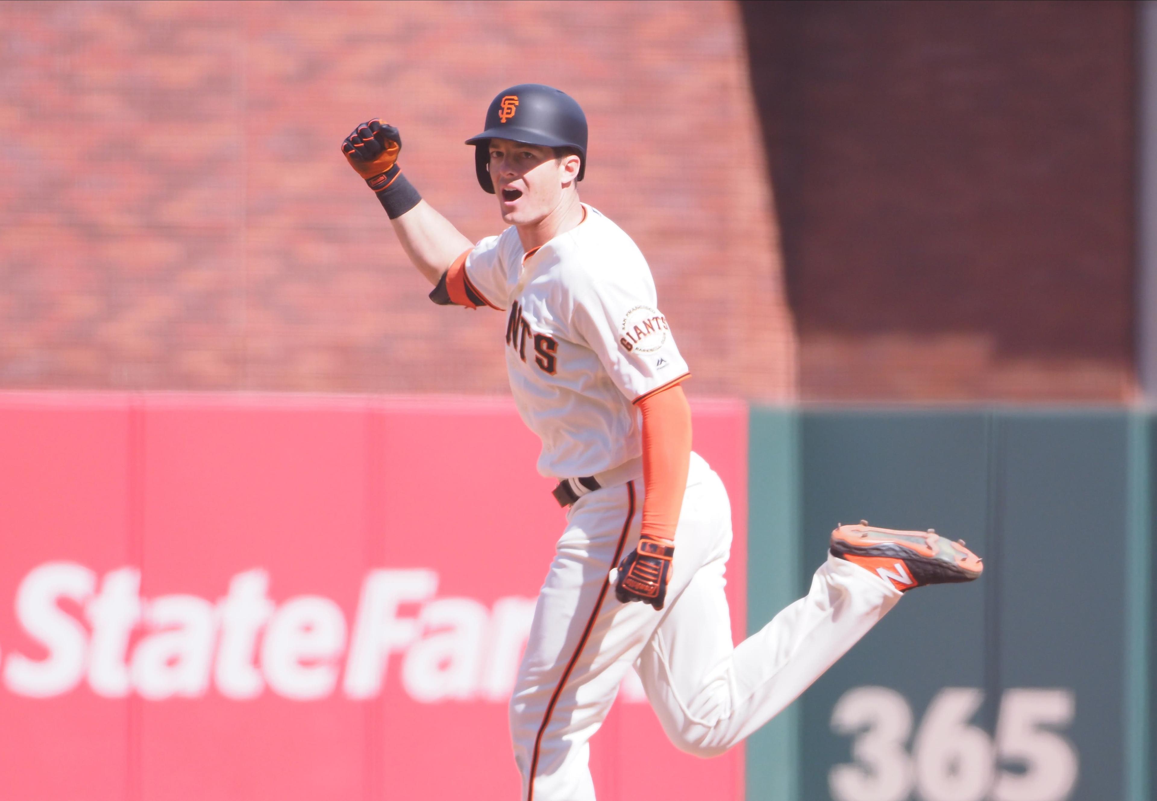 Jul 21, 2019; San Francisco, CA, USA; San Francisco Giants left fielder Mike Yastrzemski (5) celebrates as he rounds the bases on a solo home run for a walk-off win against the New York Mets during the twelfth inning at Oracle Park. Mandatory Credit: Kelley L Cox-USA TODAY Sports / Kelley L Cox