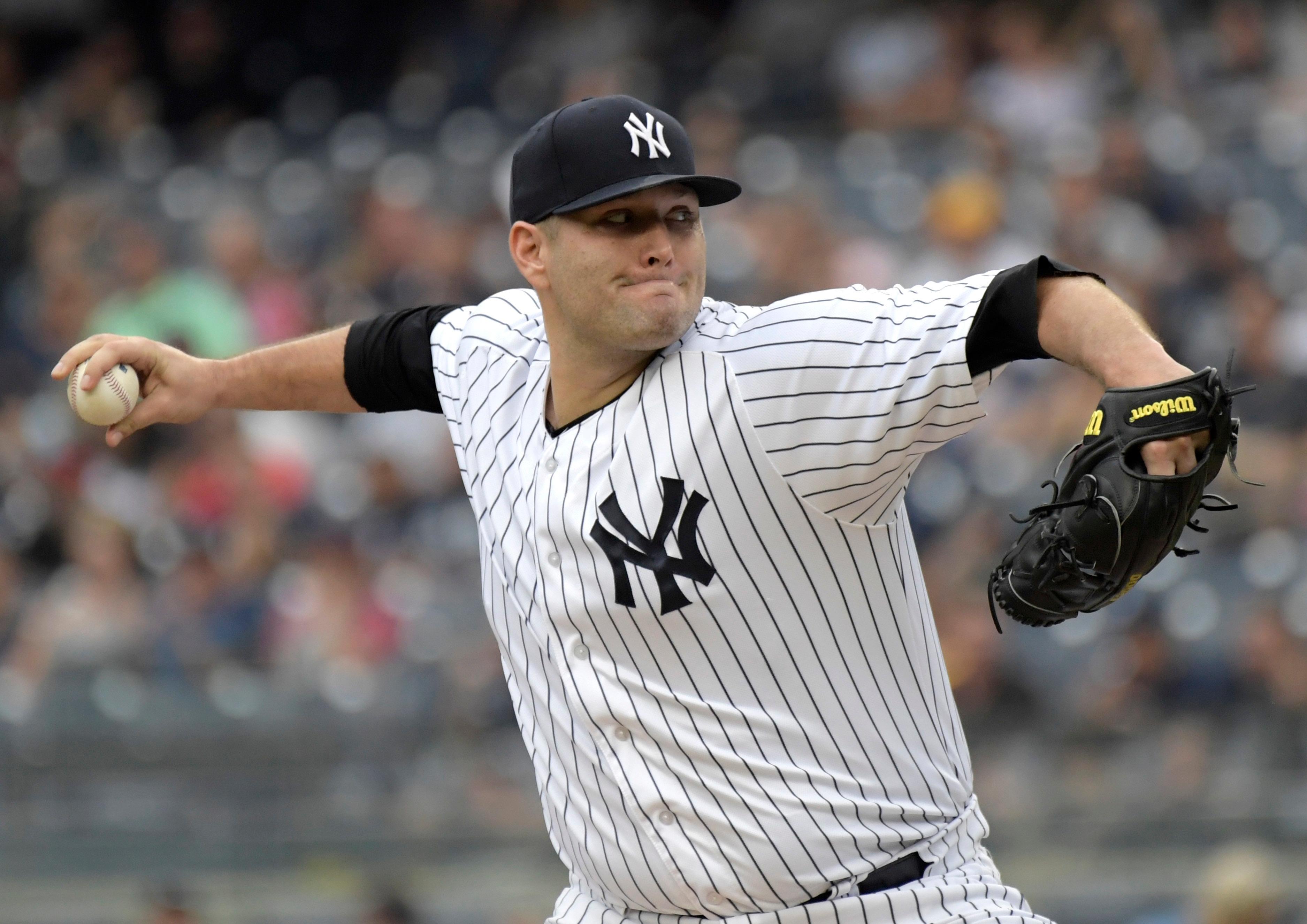 New York Yankees pitcher Lance Lynn delivers the ball to the Detroit Tigers during the first inning.