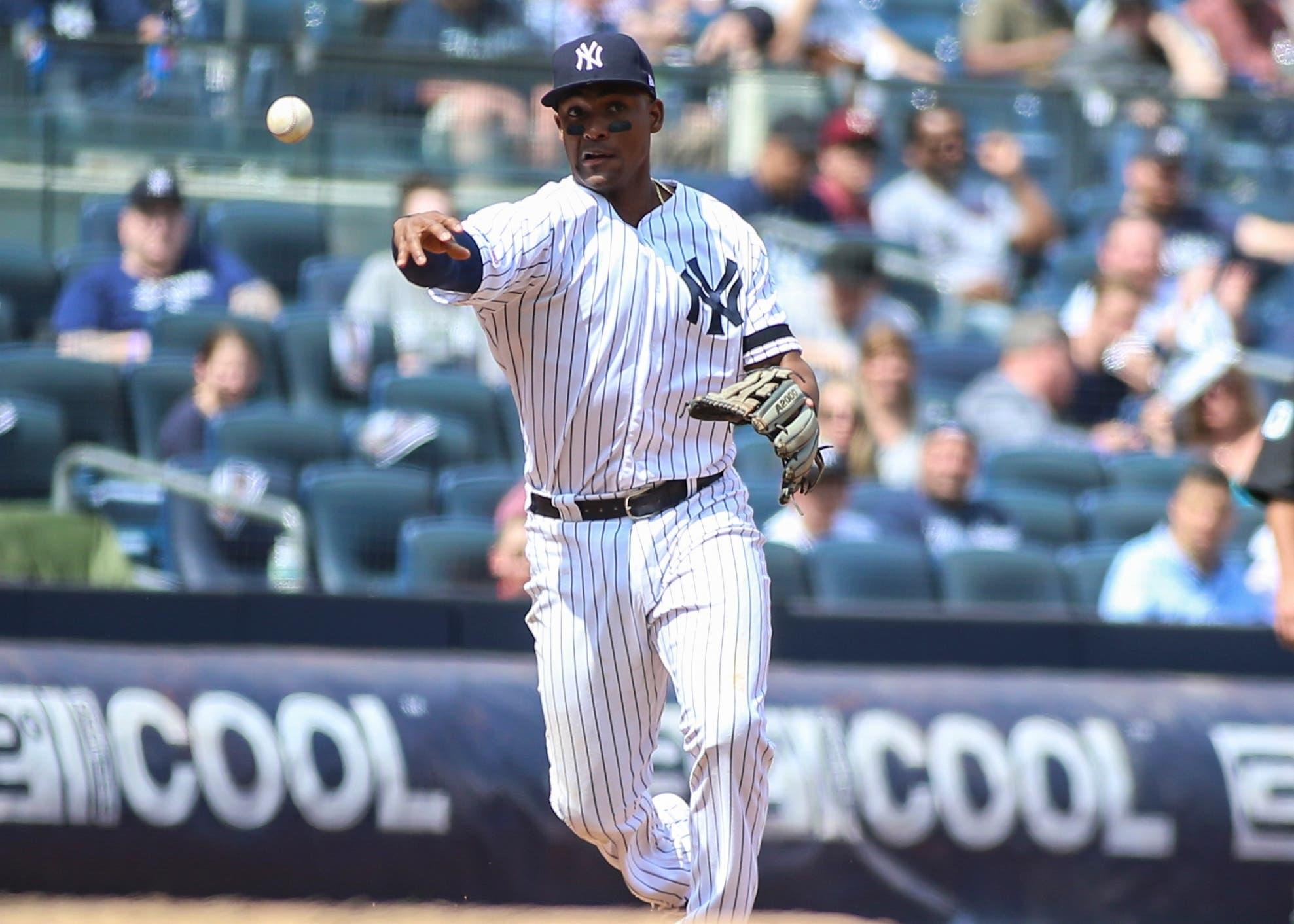 New York Yankees third baseman Miguel Andujar throws out a runner against the Minnesota Twins at Yankee Stadium. / Wendell Cruz/USA TODAY Sports