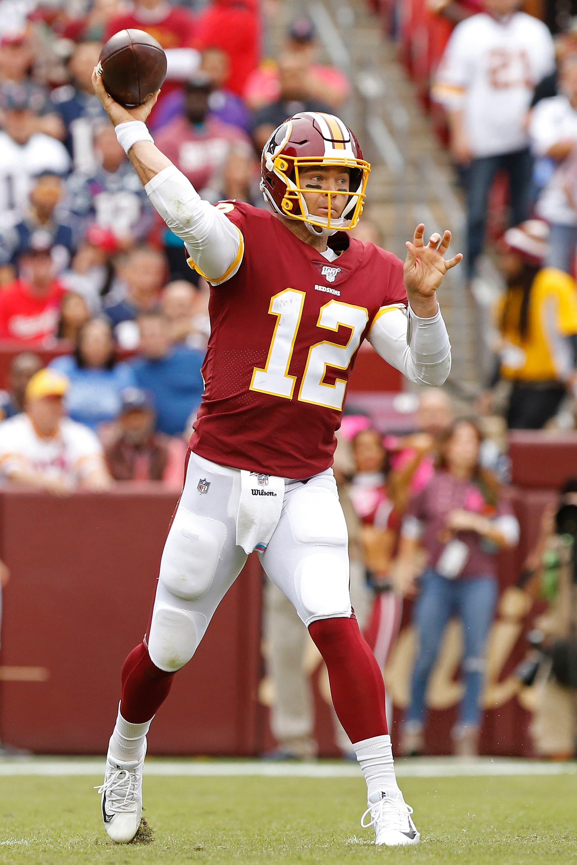 Oct 6, 2019; Landover, MD, USA; Washington Redskins quarterback Colt McCoy (12) passes the ball against the New England Patriots at FedExField. Mandatory Credit: Geoff Burke-USA TODAY Sports / Geoff Burke