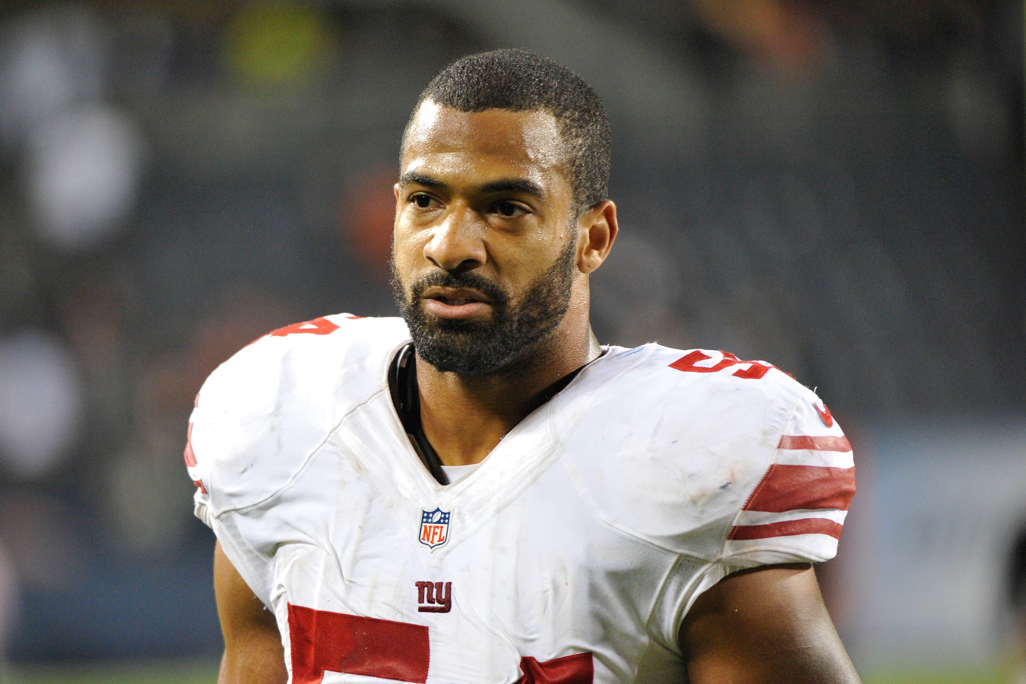 Oct 10, 2013; Chicago, IL, USA; New York Giants outside linebacker Spencer Paysinger (54) during the second half at Soldier Field. The Bears beat the Giants 27-21. Mandatory Credit: Rob Grabowski-USA TODAY Sports / Rob Grabowski