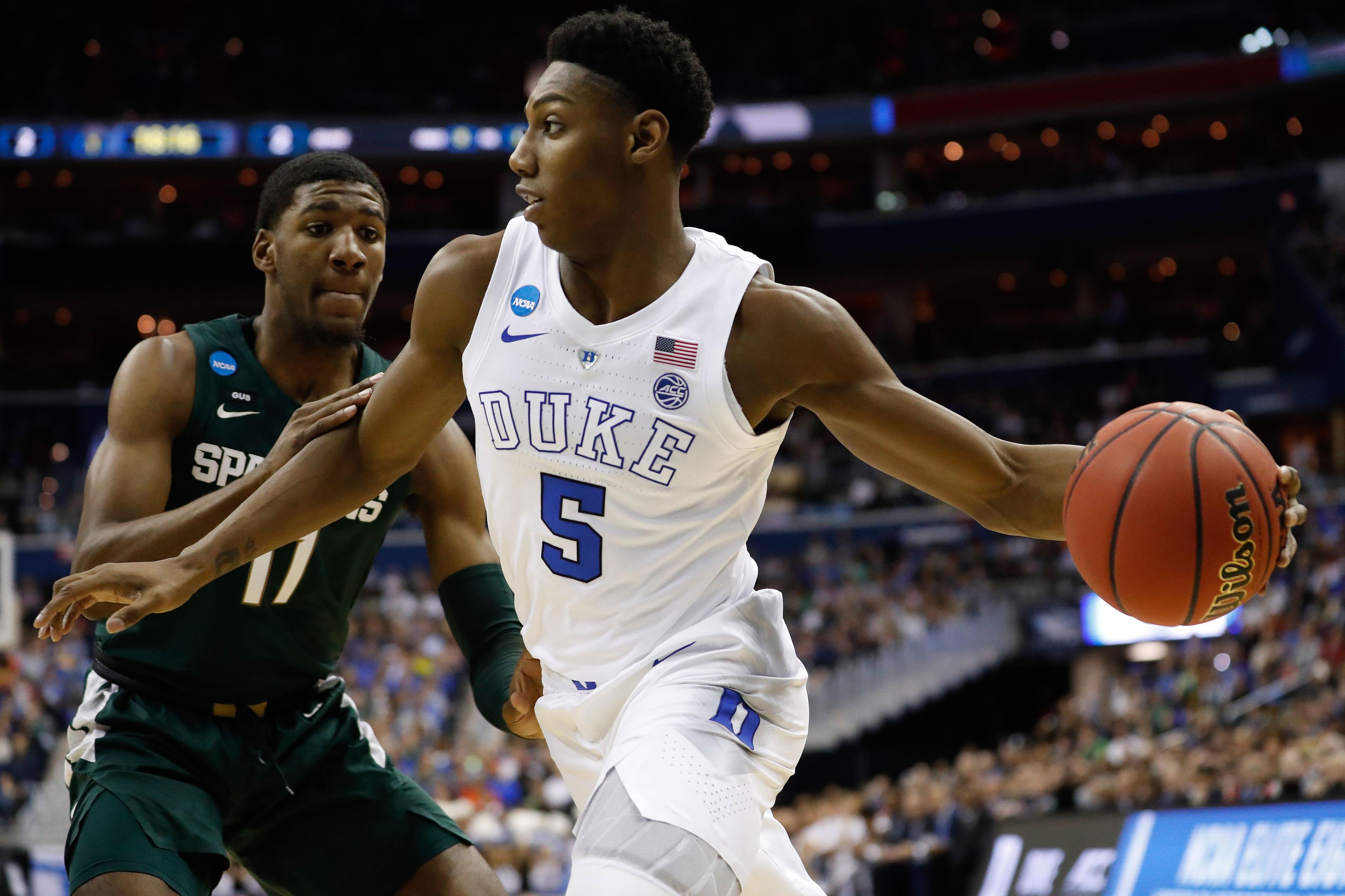 Mar 31, 2019; Washington, DC, USA; Duke Blue Devils forward RJ Barrett (5) drives to the basket as Michigan State Spartans forward Aaron Henry (11) defends in the championship game of the east regional of the 2019 NCAA Tournament at Capital One Arena. Mandatory Credit: Geoff Burke-USA TODAY Sports / Geoff Burke