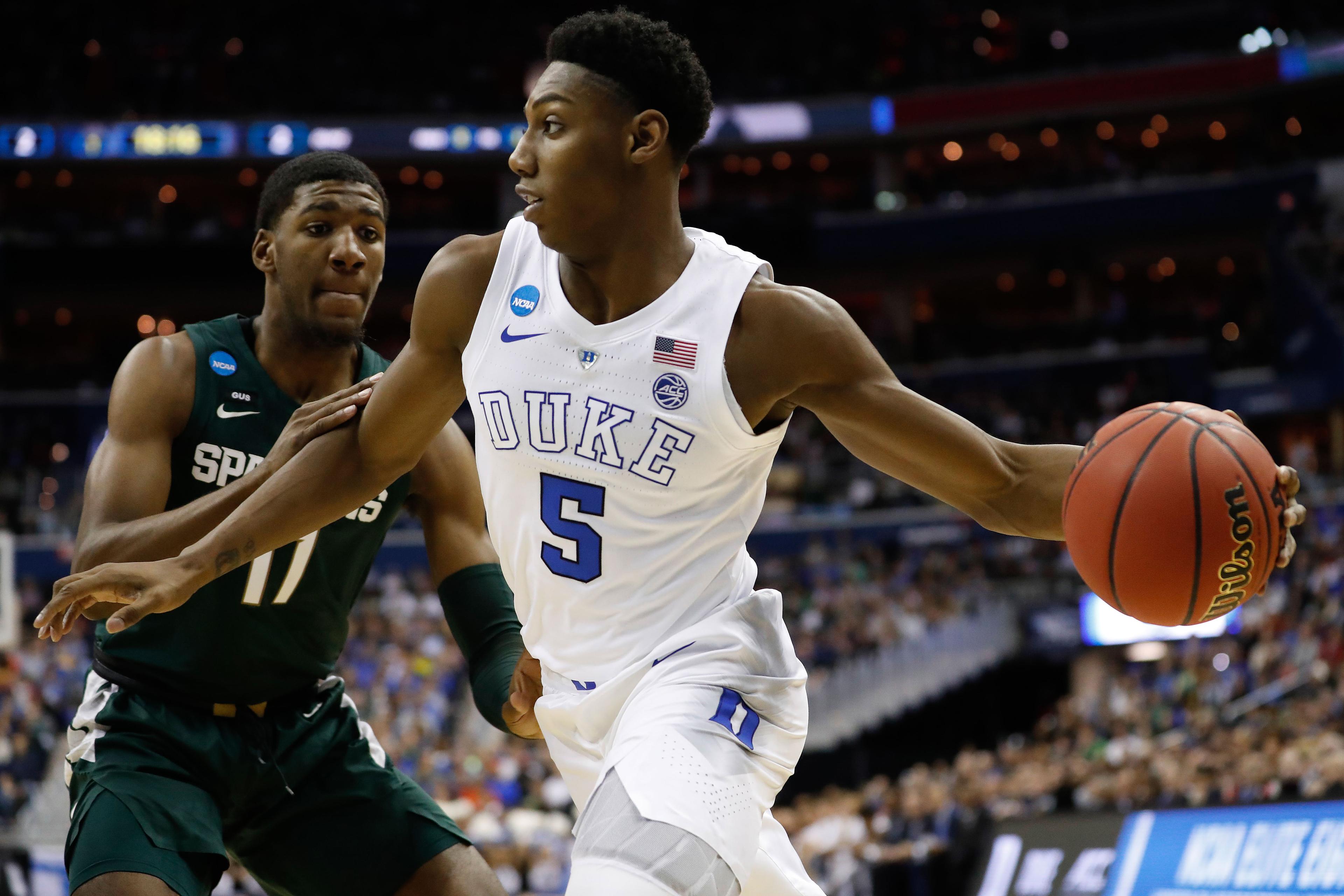 Mar 31, 2019; Washington, DC, USA; Duke Blue Devils forward RJ Barrett (5) drives to the basket as Michigan State Spartans forward Aaron Henry (11) defends in the championship game of the east regional of the 2019 NCAA Tournament at Capital One Arena. Mandatory Credit: Geoff Burke-USA TODAY Sports