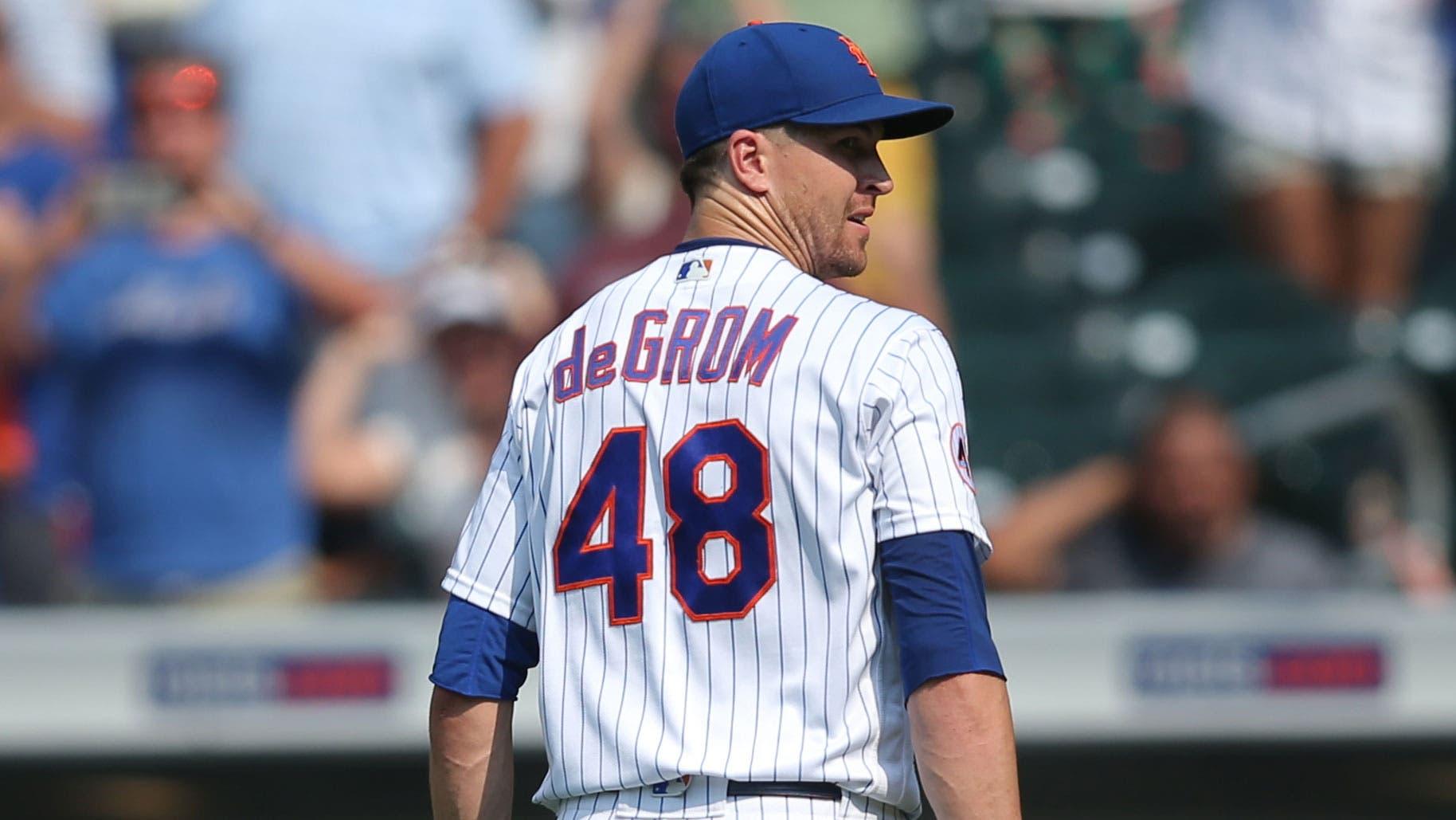 Jul 7, 2021; New York City, New York, USA; New York Mets starting pitcher Jacob deGrom (48) walks off the field after pitching the top of the seventh inning against the Milwaukee Brewers at Citi Field. / Brad Penner-USA TODAY Sports